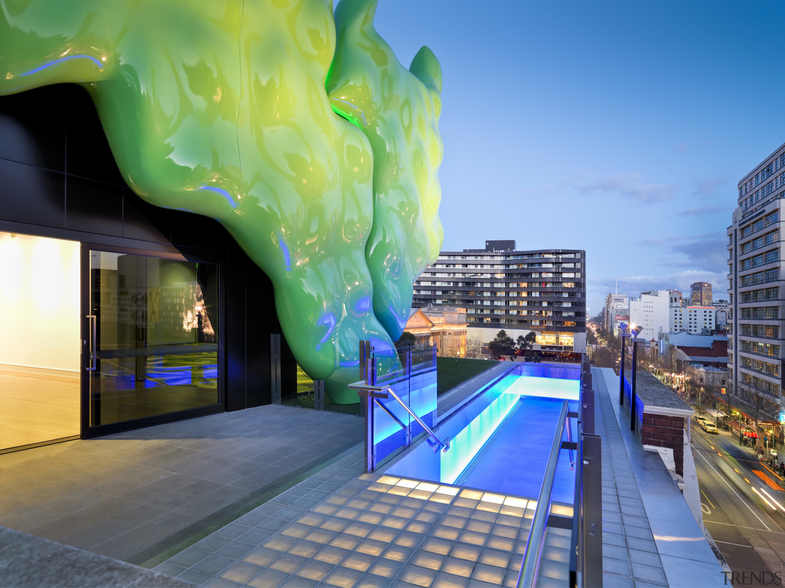 View of RMIT building in Melbourne with green architecture, leisure, real estate, sky, teal