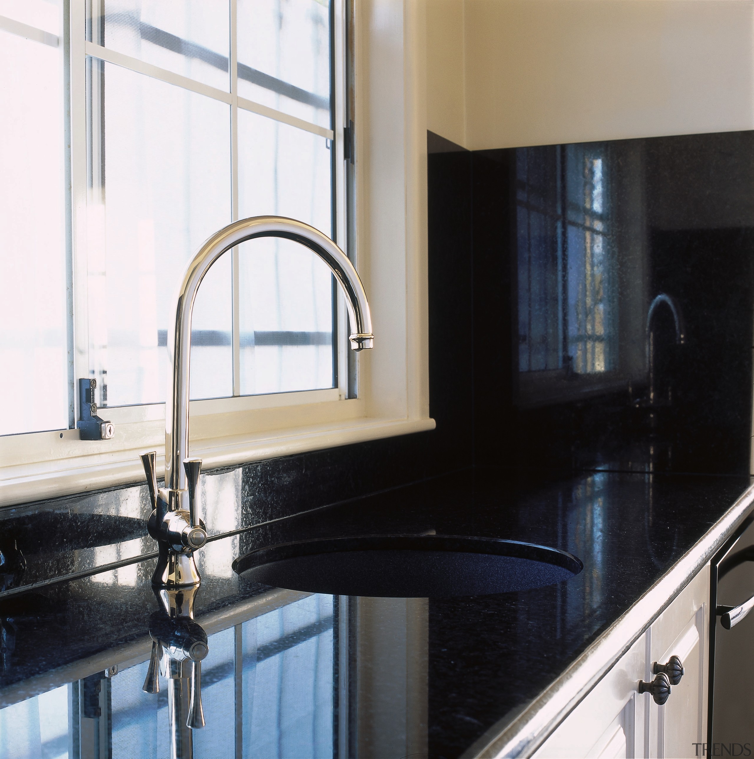 Kitchen with black granite benchtop and splashback, white countertop, glass, kitchen, room, sink, tap, window, white, black