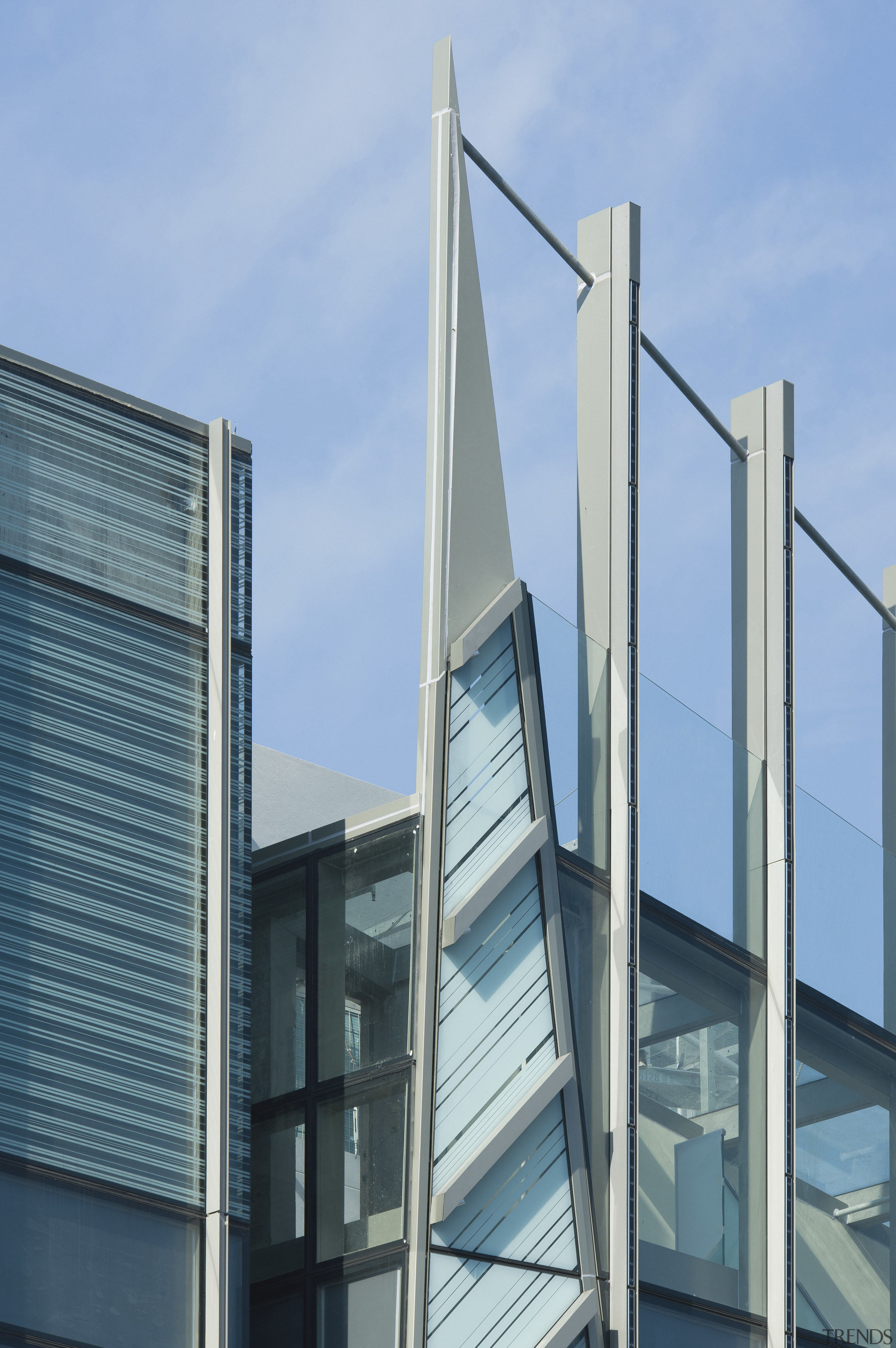 25 level retail outlet on Hong-Kong island. Theme architecture, building, commercial building, condominium, corporate headquarters, daylighting, daytime, facade, glass, metropolitan area, sky, skyscraper, tower block, window, teal