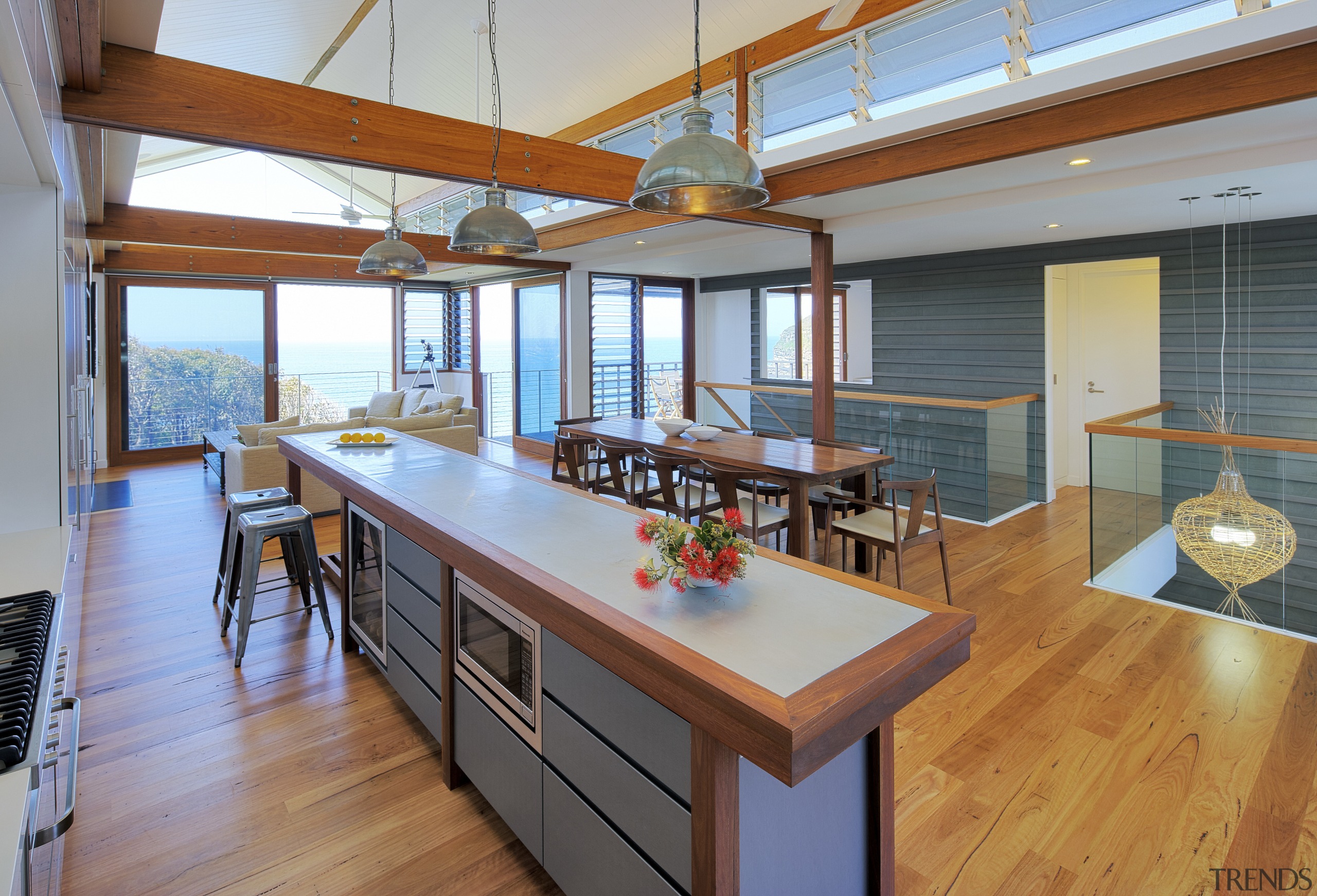 The blue-grey zinc panels on this kitchen island countertop, house, interior design, kitchen, real estate, wood, gray, brown