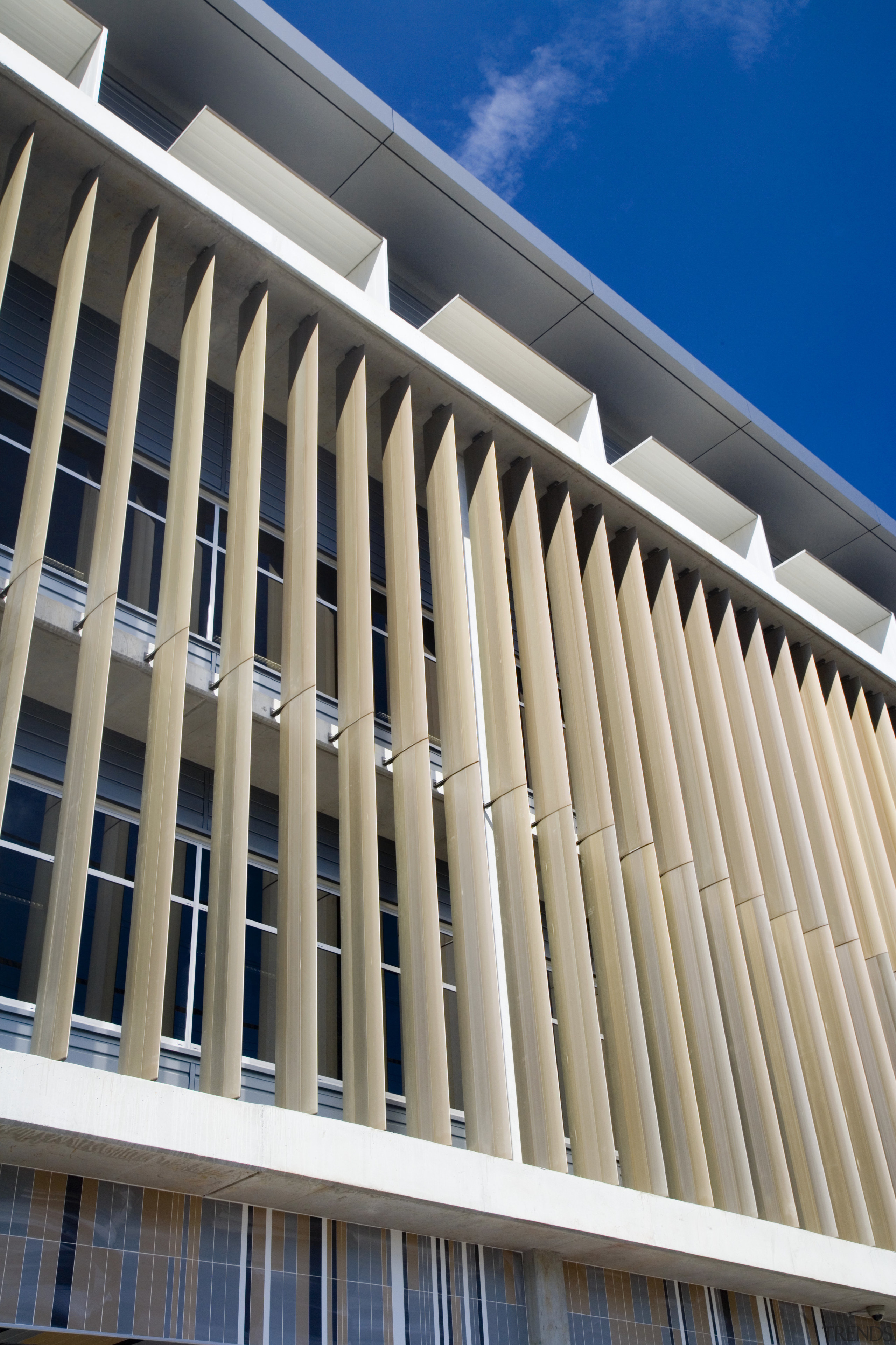 A view of the exterior of the greensquare architecture, building, commercial building, condominium, corporate headquarters, daylighting, daytime, facade, landmark, line, residential area, siding, structure, window, gray