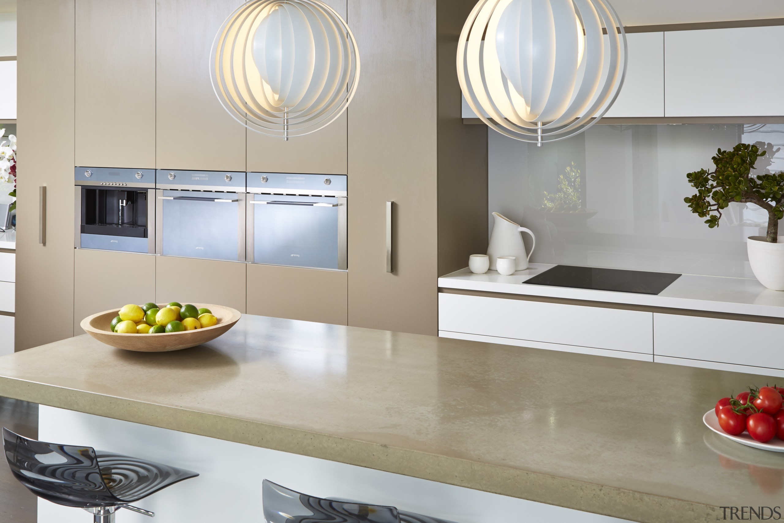 Designer Carolyn Cavanough of Desire Beauty specified a countertop, interior design, kitchen, product design, sink, tap, gray, white