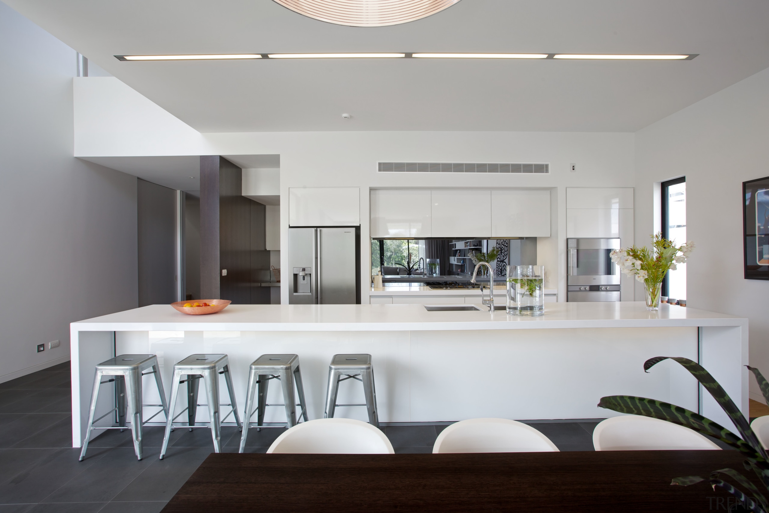 A 5m-long island with a Caesarstone top and architecture, countertop, house, interior design, kitchen, real estate, table, gray