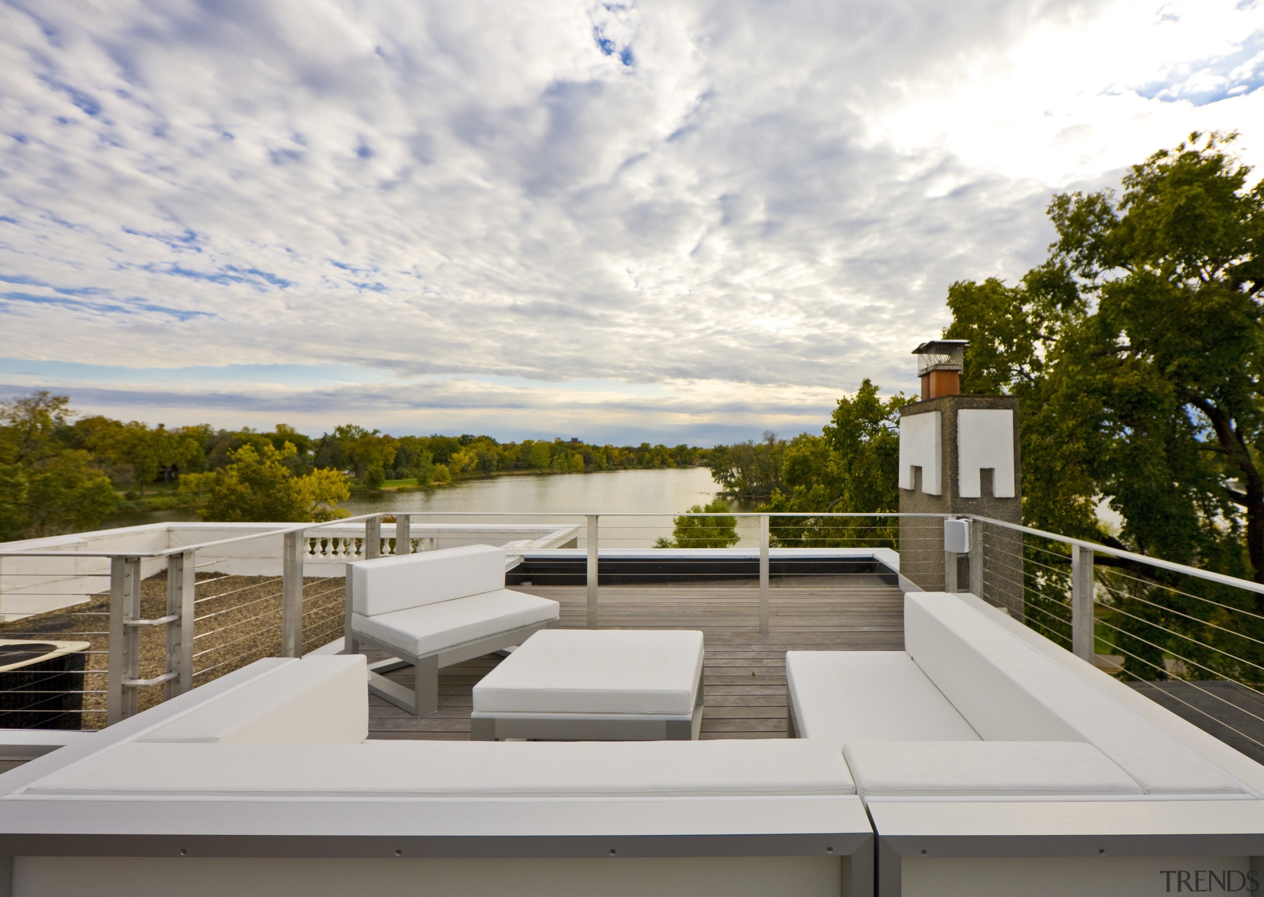 View of a multi-storey grey house with swimming condominium, home, house, property, real estate, roof, white