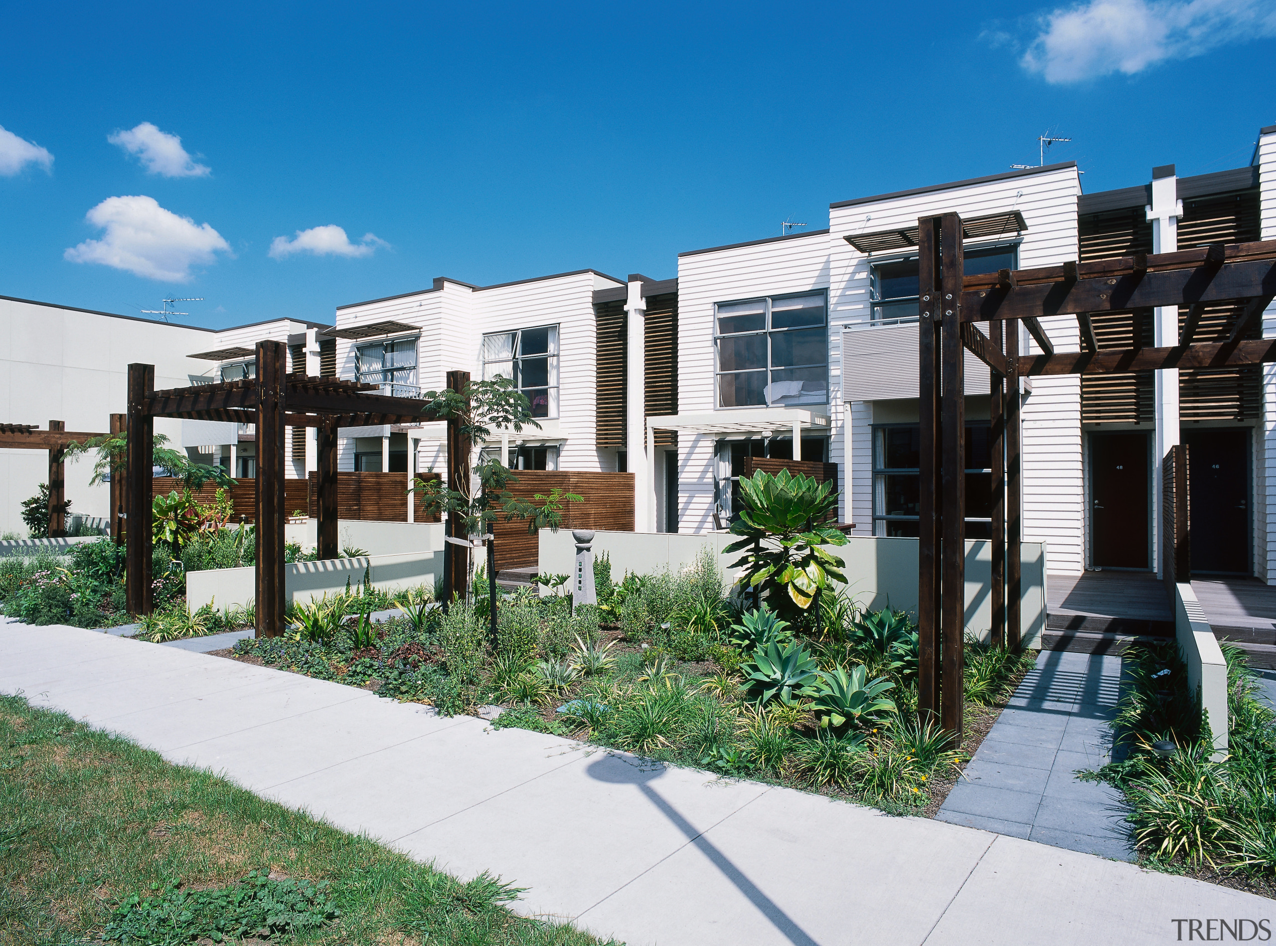 Row of home frontages with white weatherboard cladding apartment, architecture, condominium, elevation, estate, facade, home, house, mixed use, neighbourhood, property, real estate, residential area, white, teal