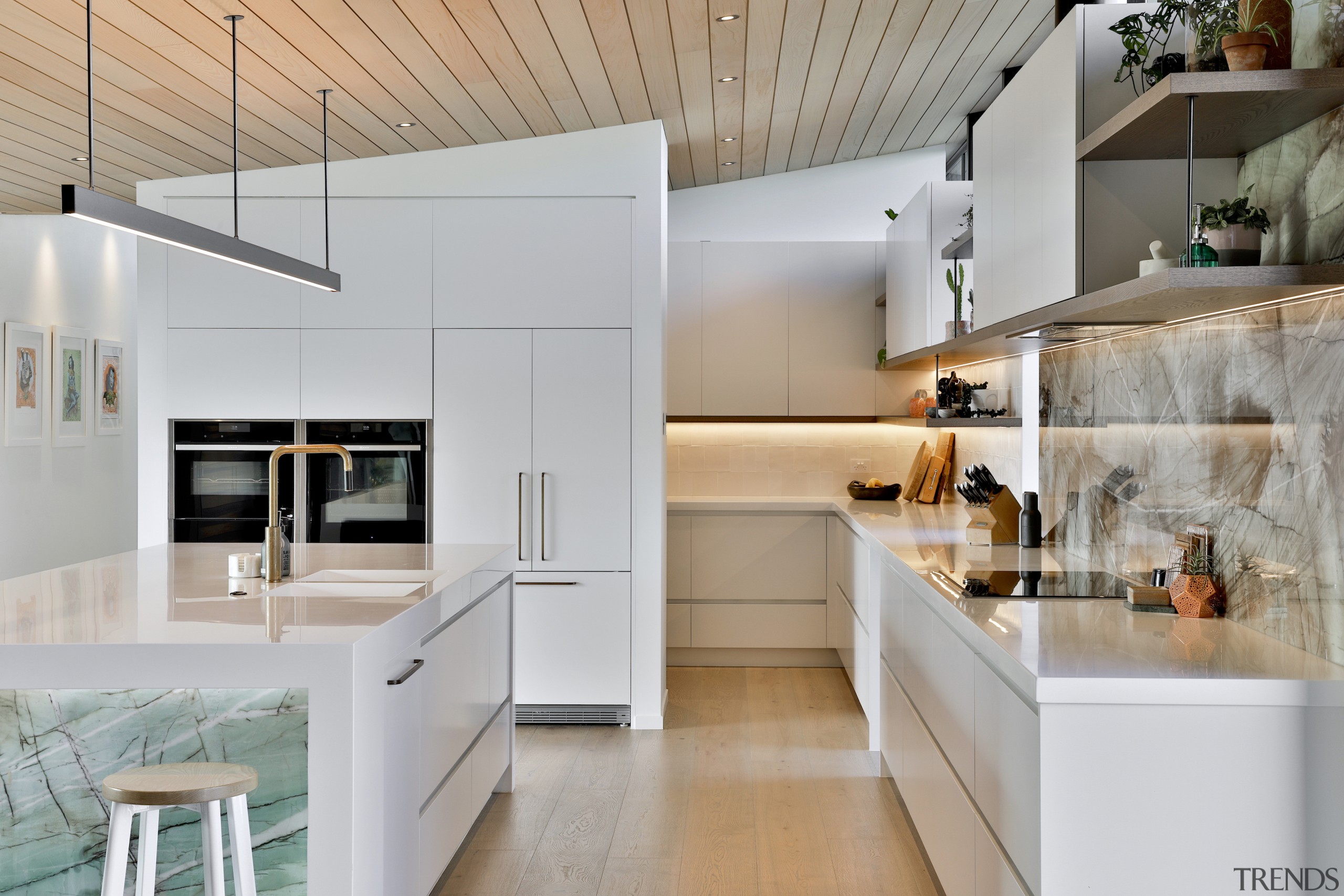 Island front and splashback are exotic counterpoints to 