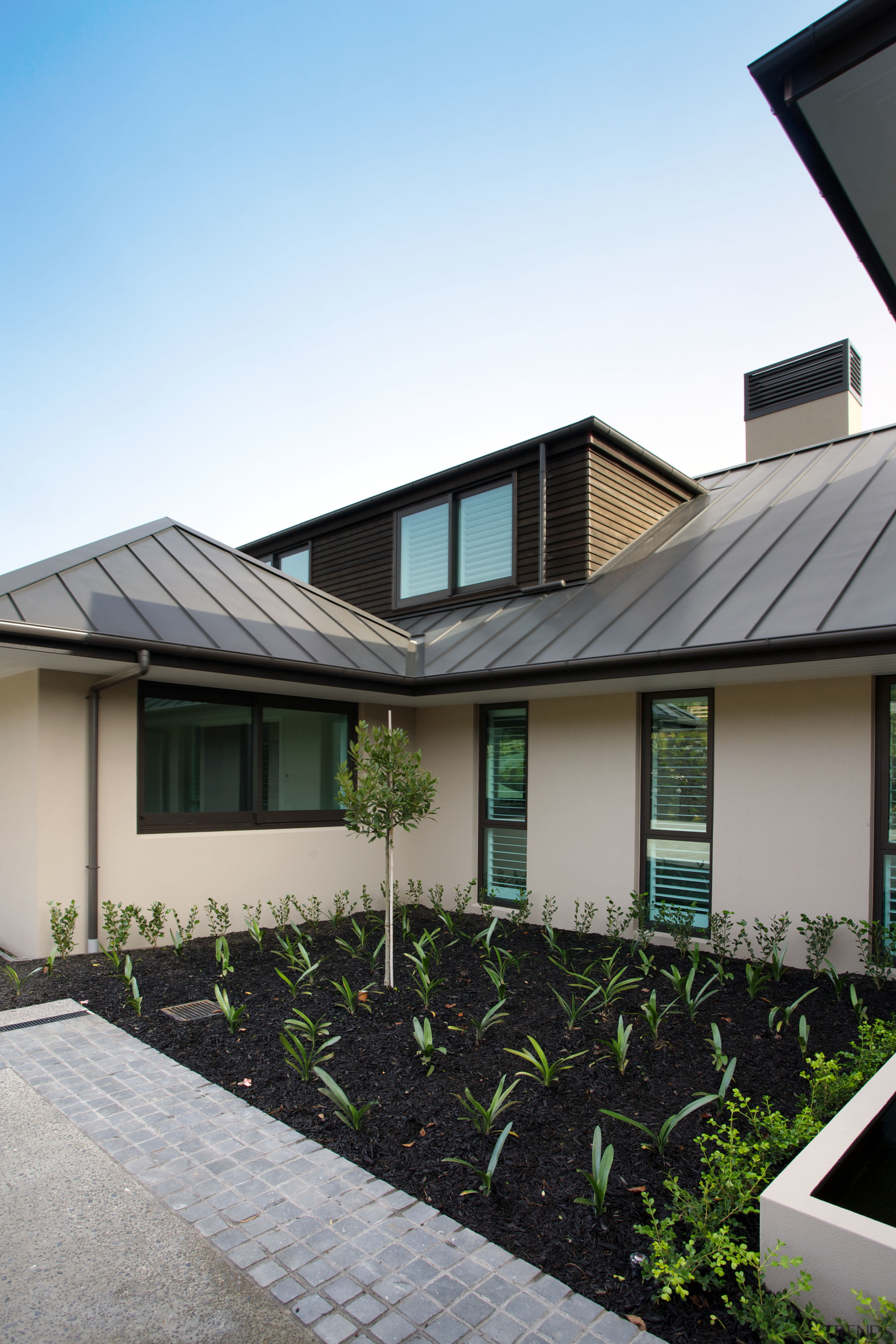 The wide pan profile of the KiwiColour steel architecture, building, daylighting, elevation, estate, facade, home, house, property, real estate, residential area, roof, siding, suburb, window, gray