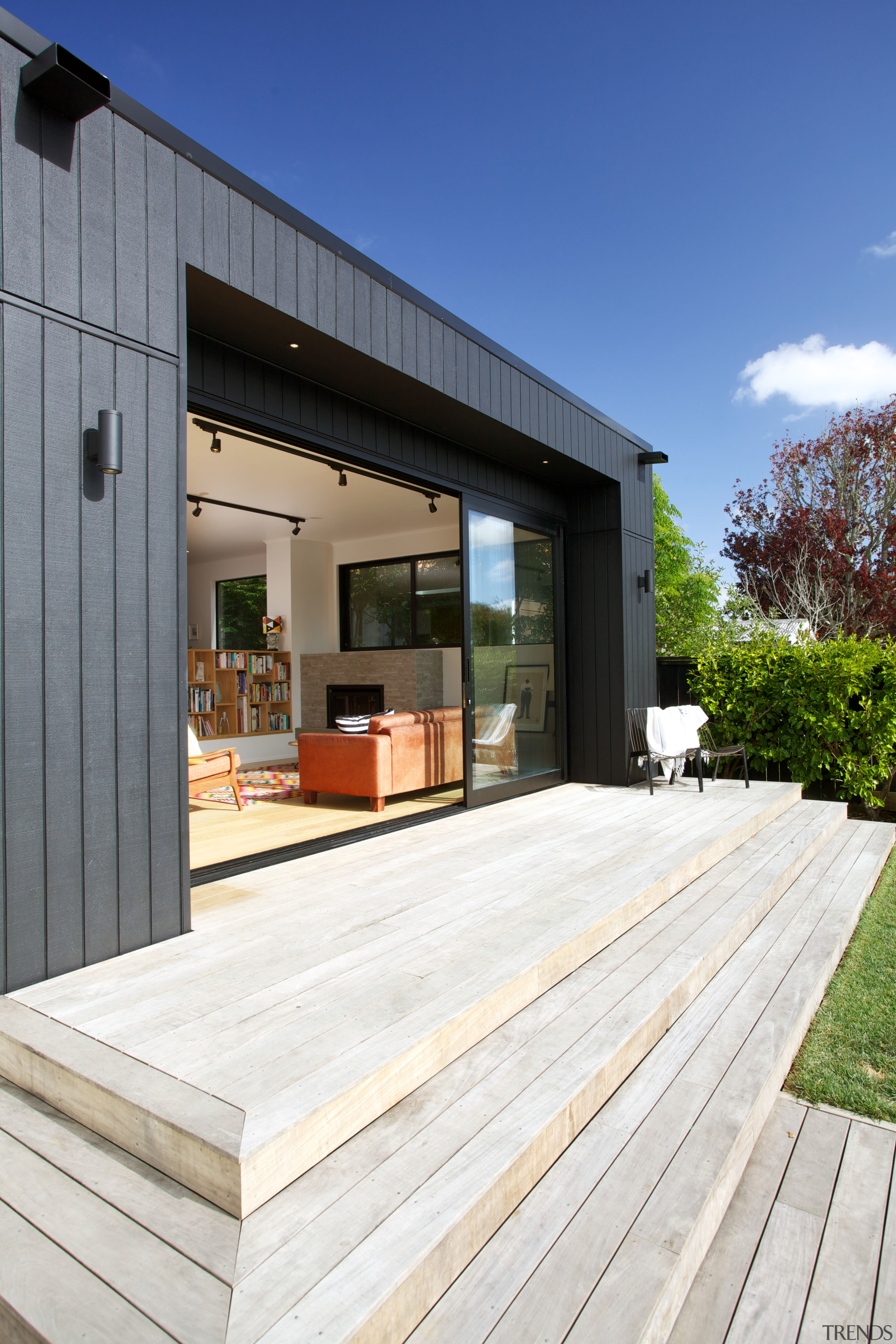 Contemporary black box addition to older home the architecture, facade, home, house, real estate, residential area, siding, window, white