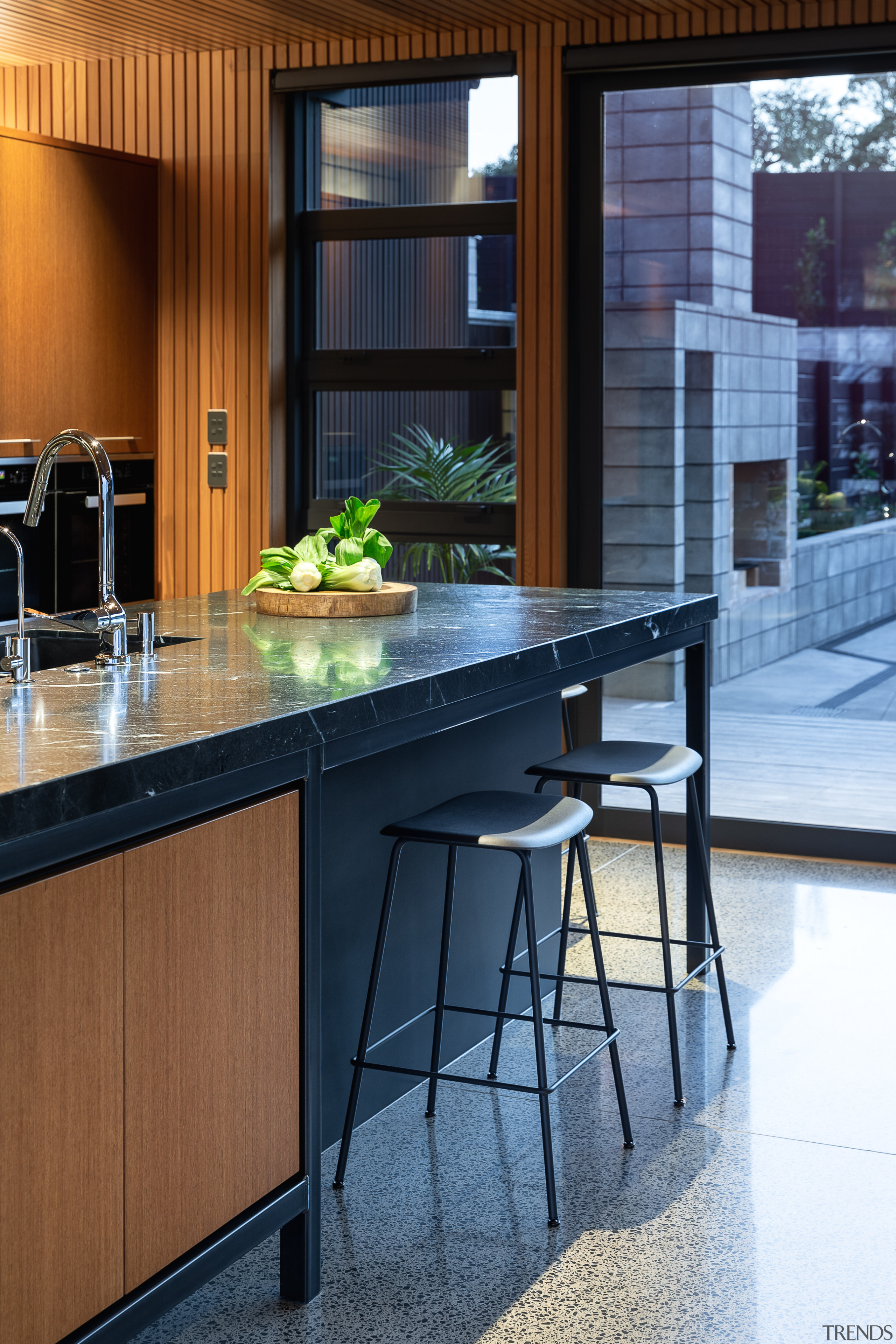 ​​​​​​​This kitchen offers easy connections to the outdoors, architecture, bar stool, building, cabinetry, ceiling, chair, countertop, design, dining room, floor, flooring, furniture, glass, hardwood, home, house, interior design, kitchen, material property, property, real estate, room, table, tile, wood, black