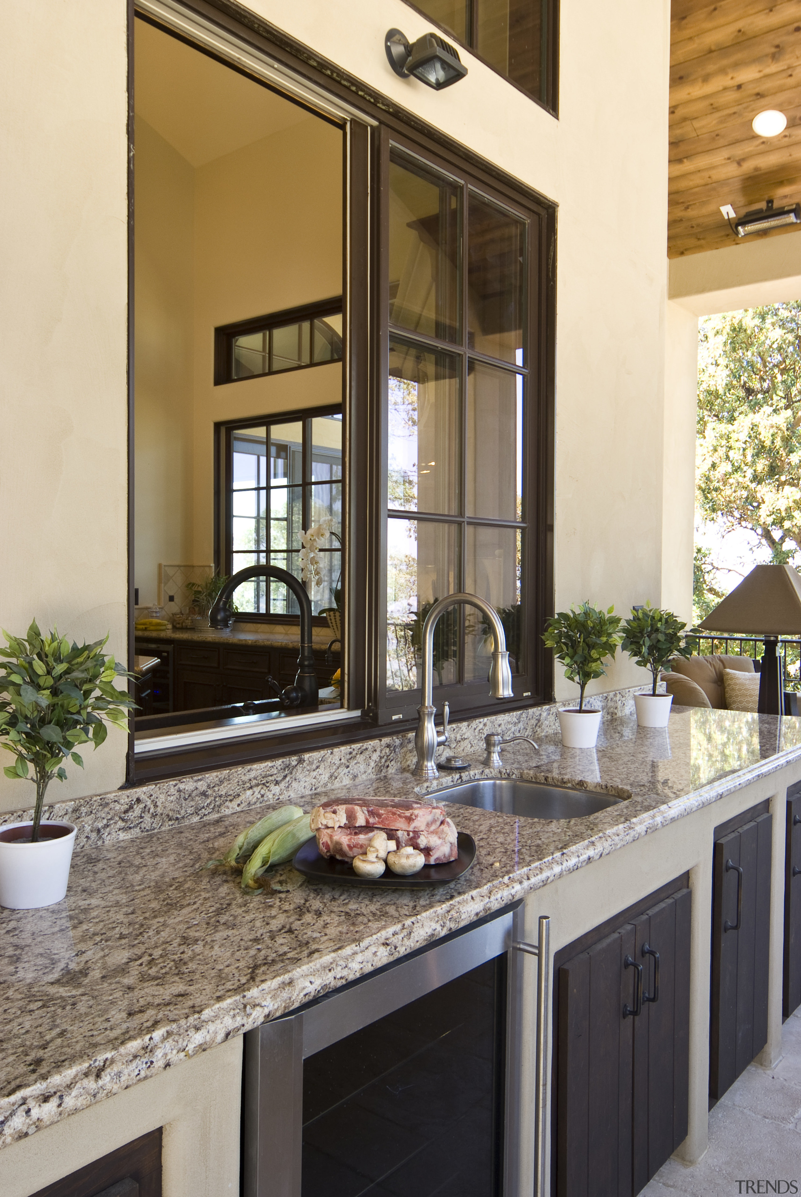 View of outdoor kitchen which features Viking barbeque, countertop, cuisine classique, estate, home, interior design, kitchen, window, orange