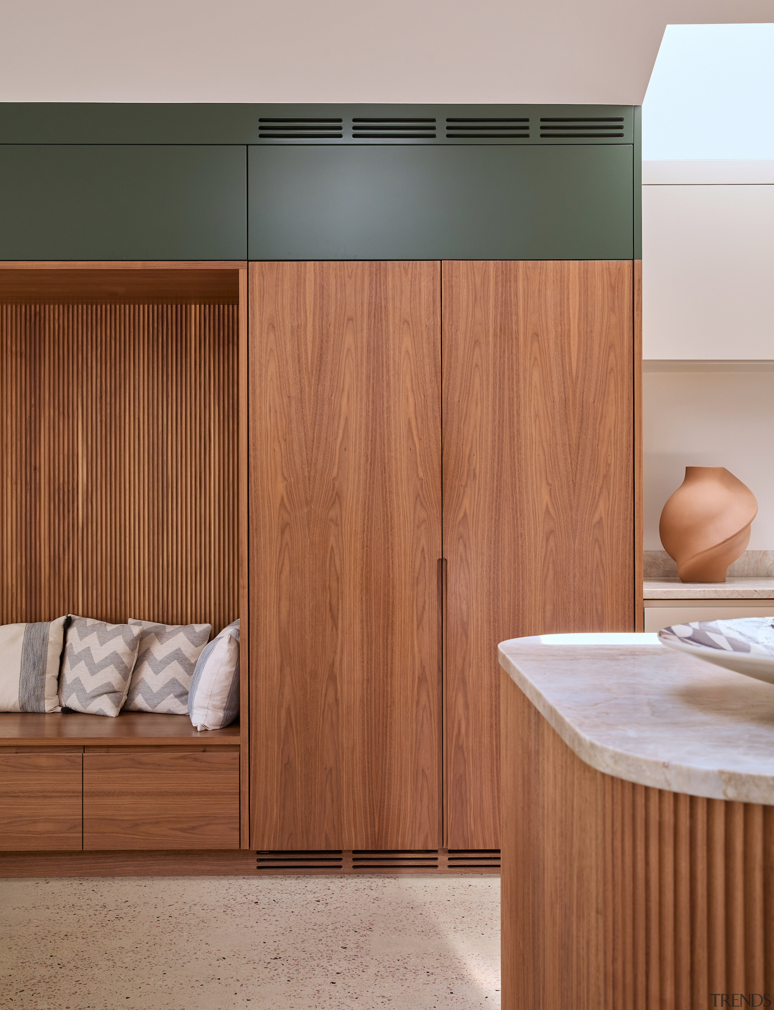 The design relies on material continuity and clean 