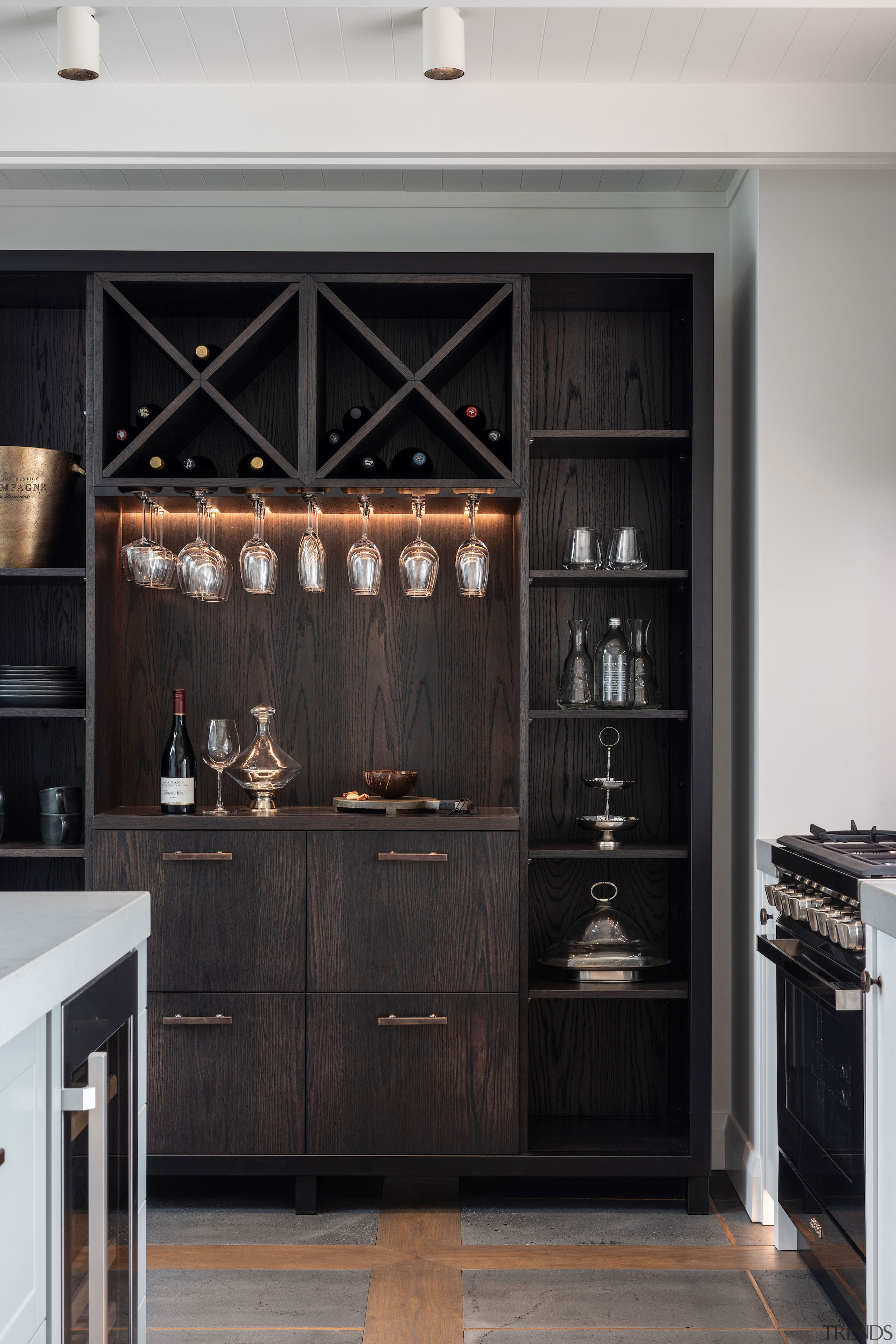 Wine bar cabinetry. - French accent by the 