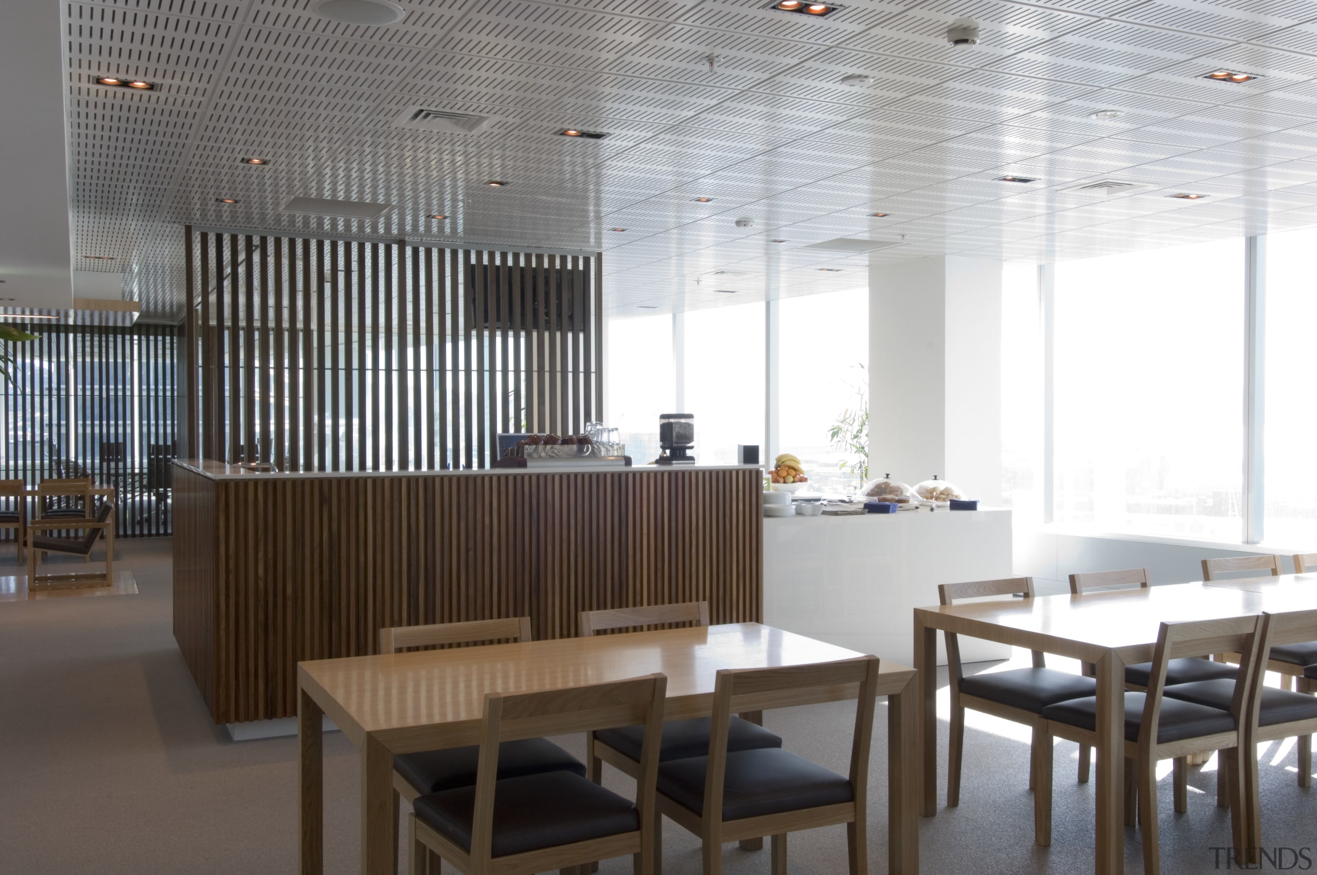 A view of the KPMG office. - A architecture, ceiling, furniture, interior design, table, white, gray