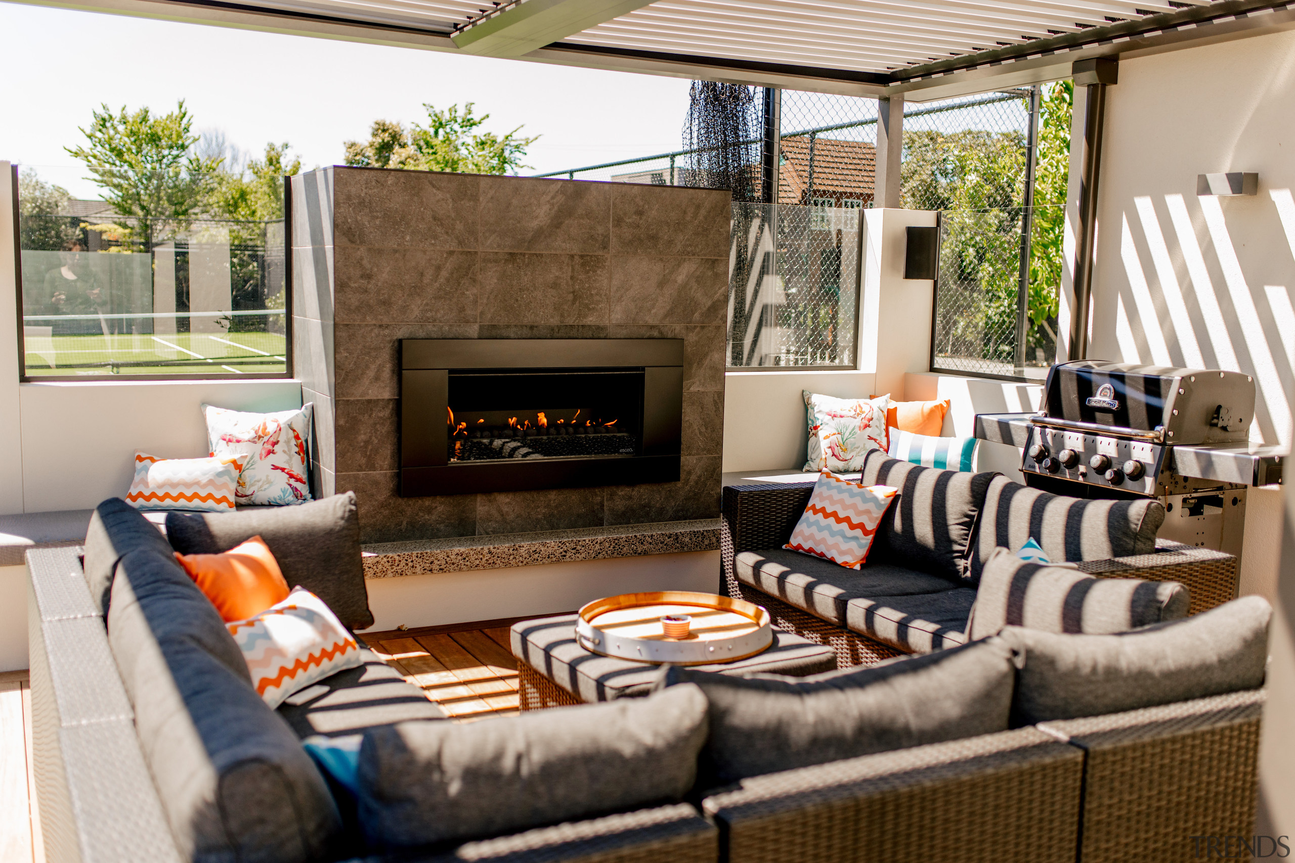 The outdoor fireplace on the patio with a 