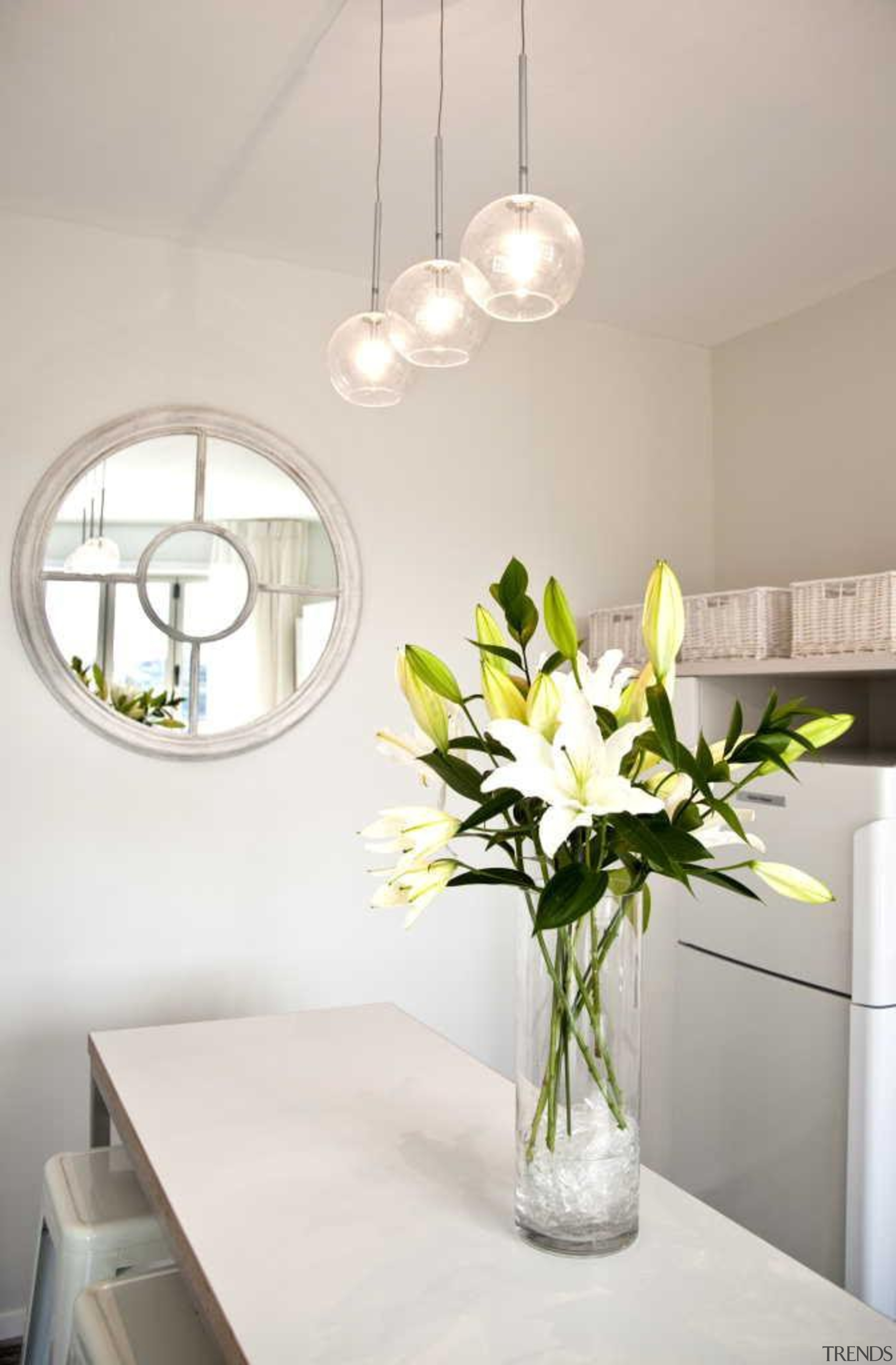 White nuance kitchen - Kitchen at Beach Apartment ceiling, chandelier, cut flowers, dining room, floral design, floristry, flower, flower arranging, home, interior design, light fixture, lighting, room, table, vase, gray