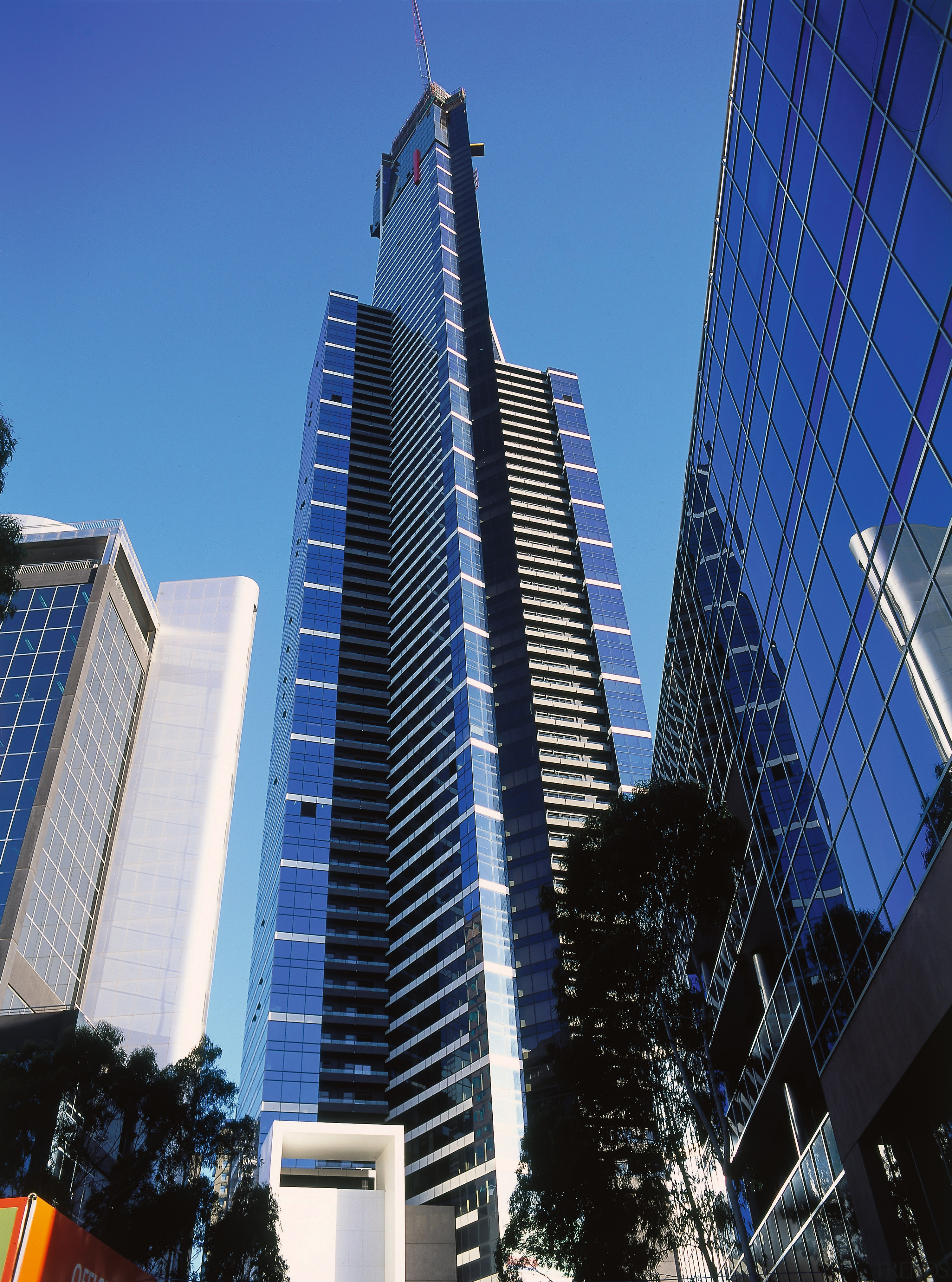 view of the Eureka 570 unit apartment building architecture, building, city, cityscape, commercial building, condominium, corporate headquarters, daytime, downtown, landmark, metropolis, metropolitan area, mixed use, sky, skyline, skyscraper, tower, tower block, urban area, blue