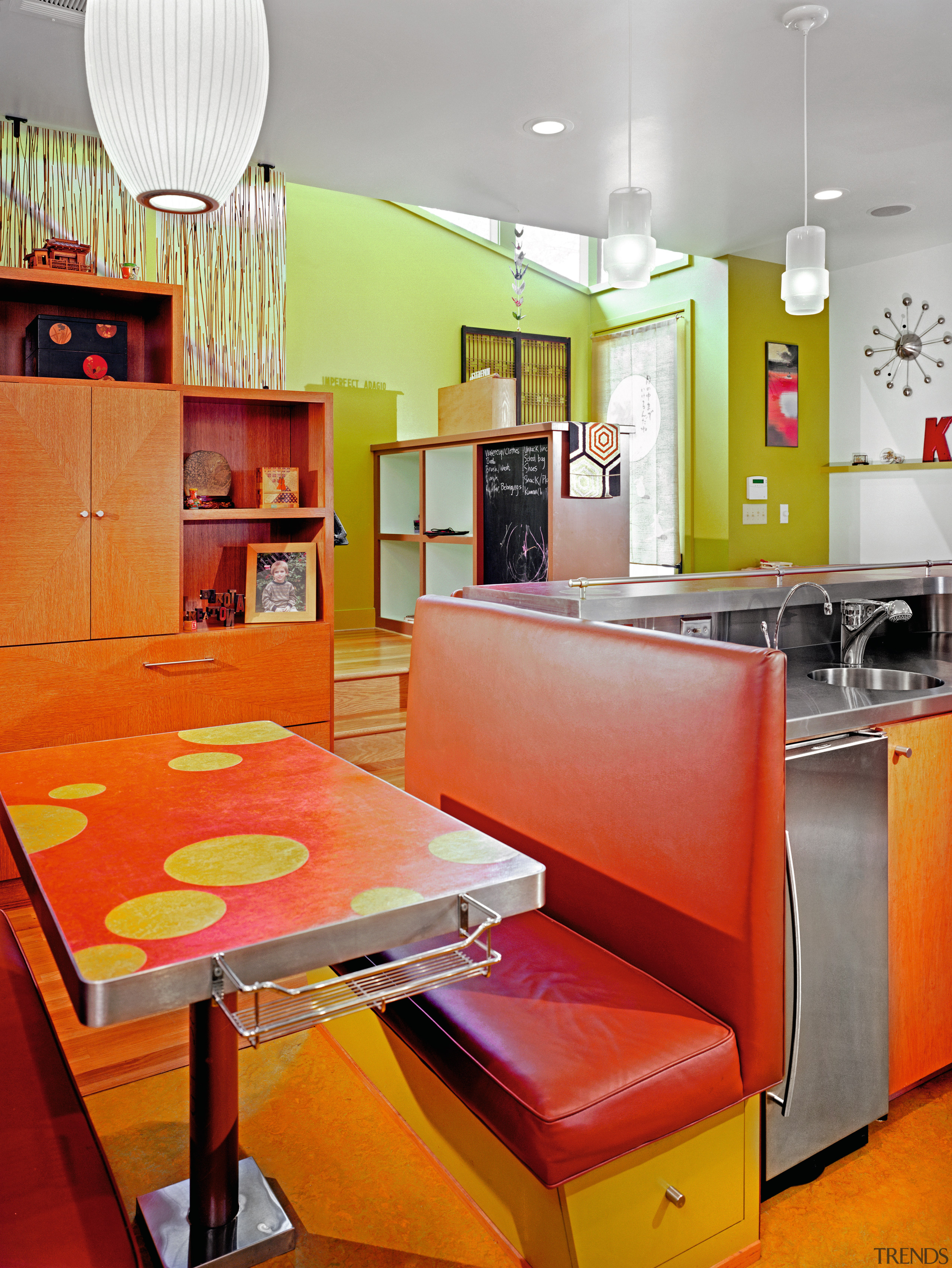 view of kitchen with stairway in the background, countertop, home, interior design, kitchen, orange, real estate, room, table, yellow, red