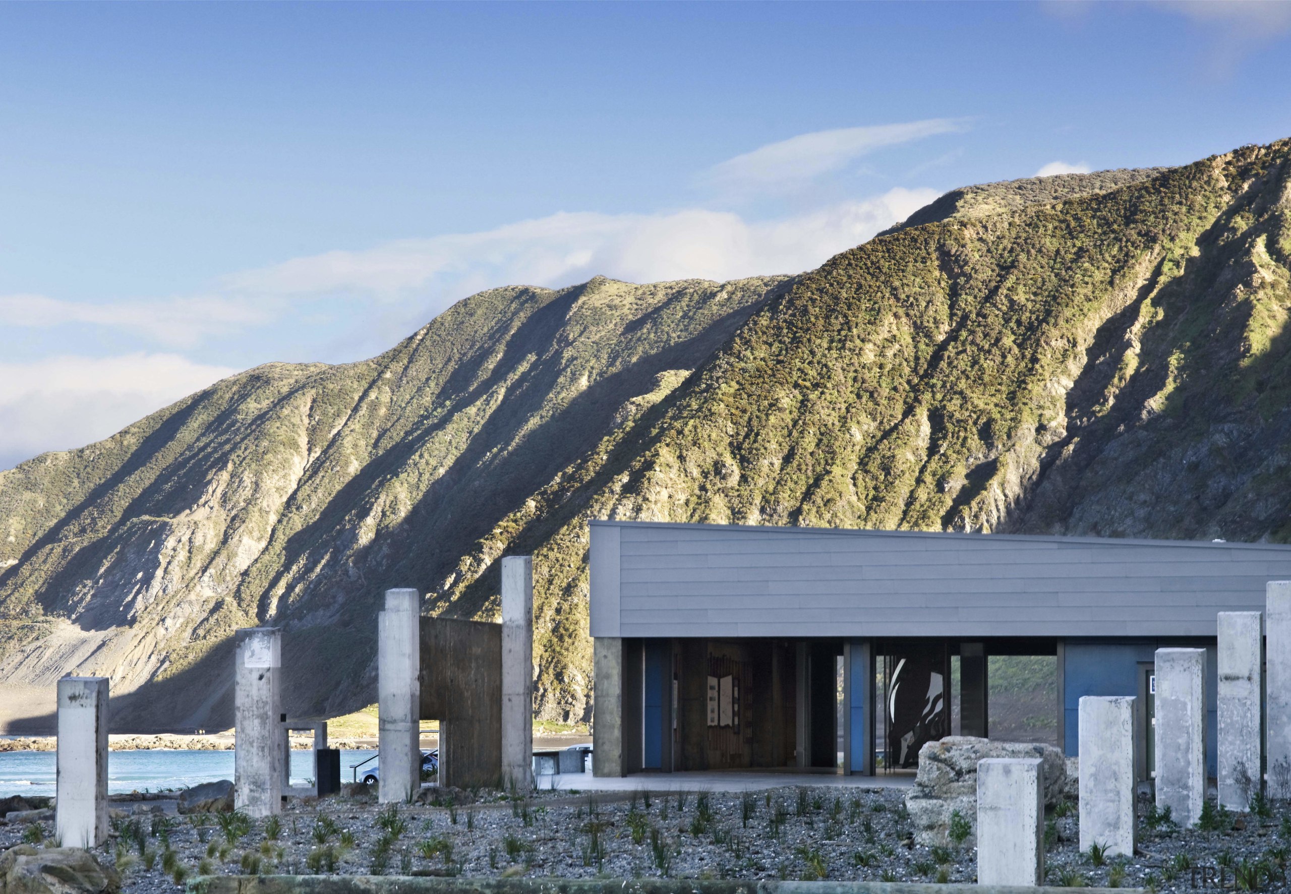 Exterior view of Te Kopahou Reserve Interpretation Centre architecture, cottage, elevation, home, house, hut, mountain, mountain range, real estate, sky, winter, teal