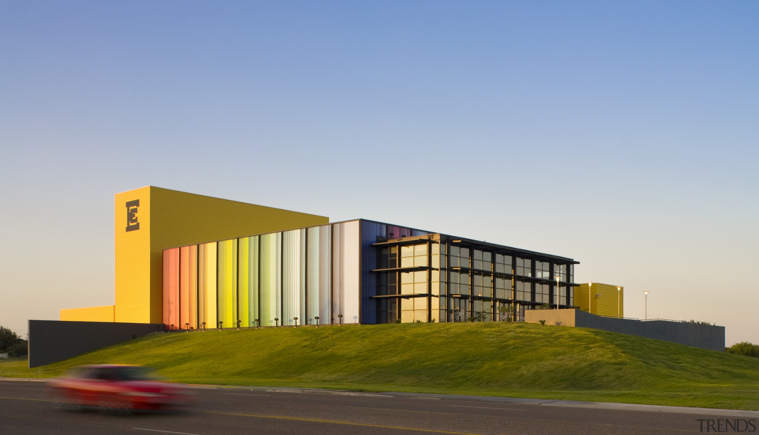 Exterior view of the Edcouch-Elsa Fine Arts Centre architecture, building, commercial building, corporate headquarters, elevation, facade, headquarters, house, real estate, sky, teal