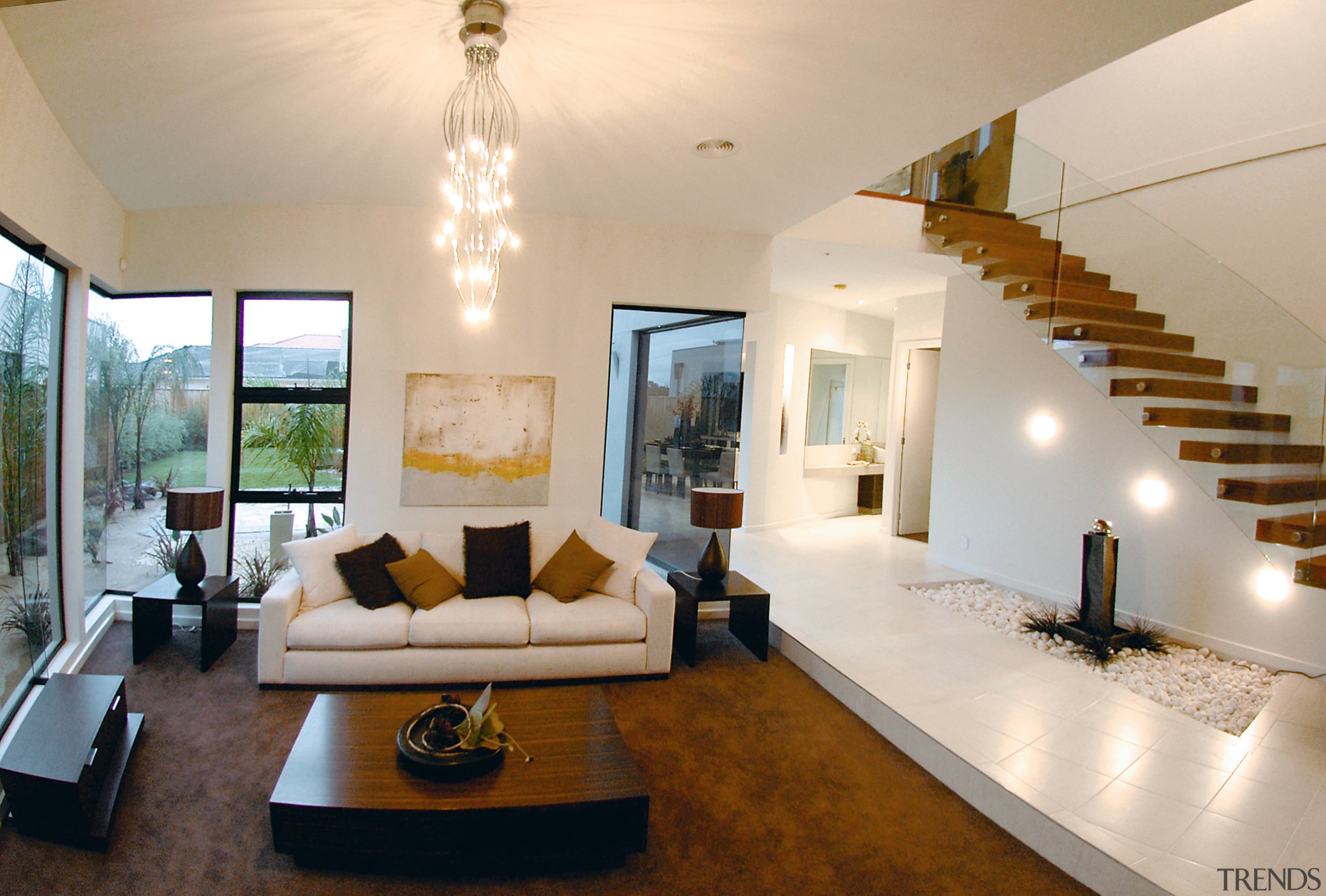 A view of  NSD home. - A ceiling, estate, floor, home, house, interior design, living room, property, real estate, room, orange