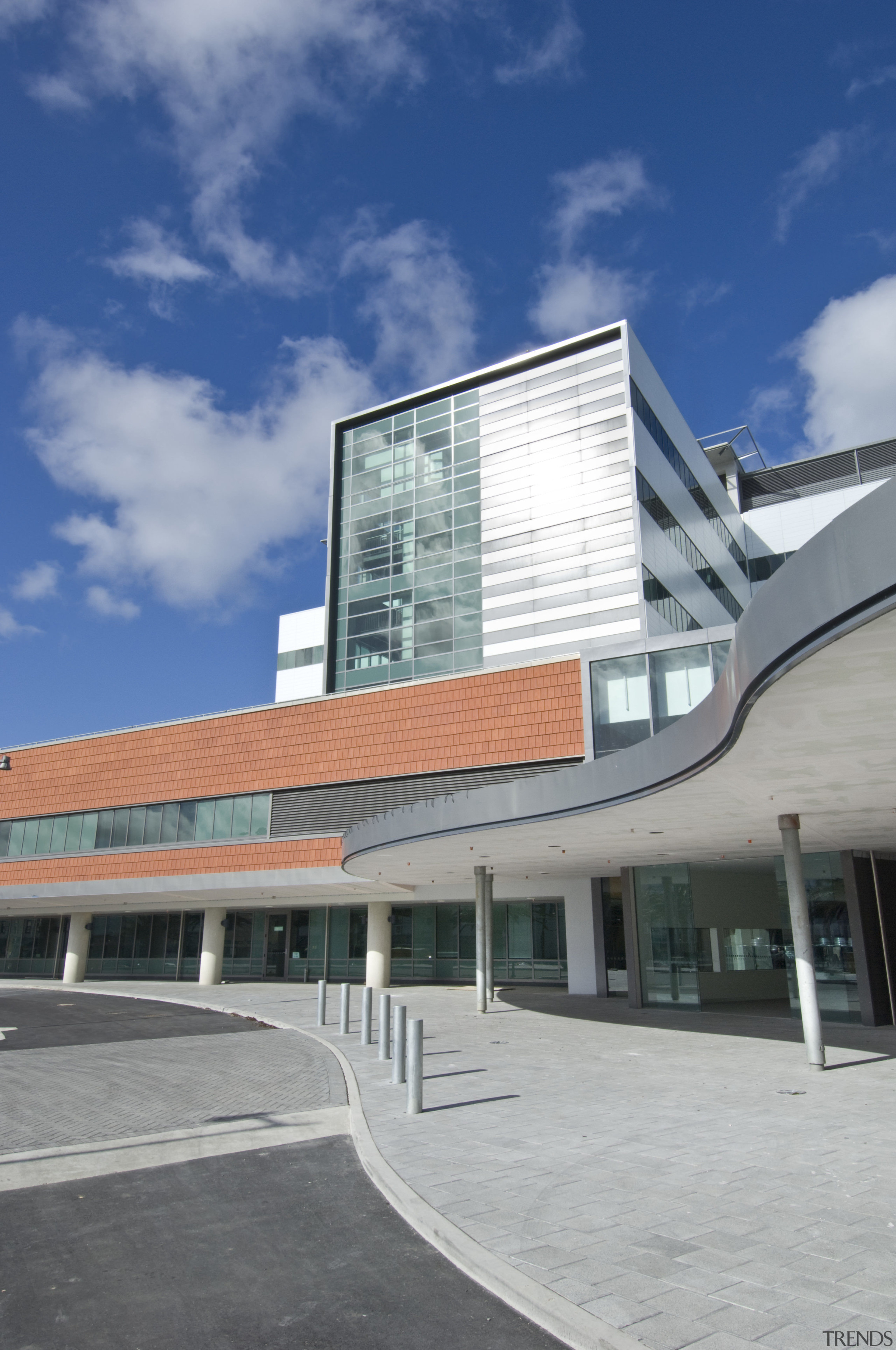 The new Wellington Regional Hospital was designed by architecture, building, commercial building, corporate headquarters, daytime, facade, headquarters, sky, gray, blue
