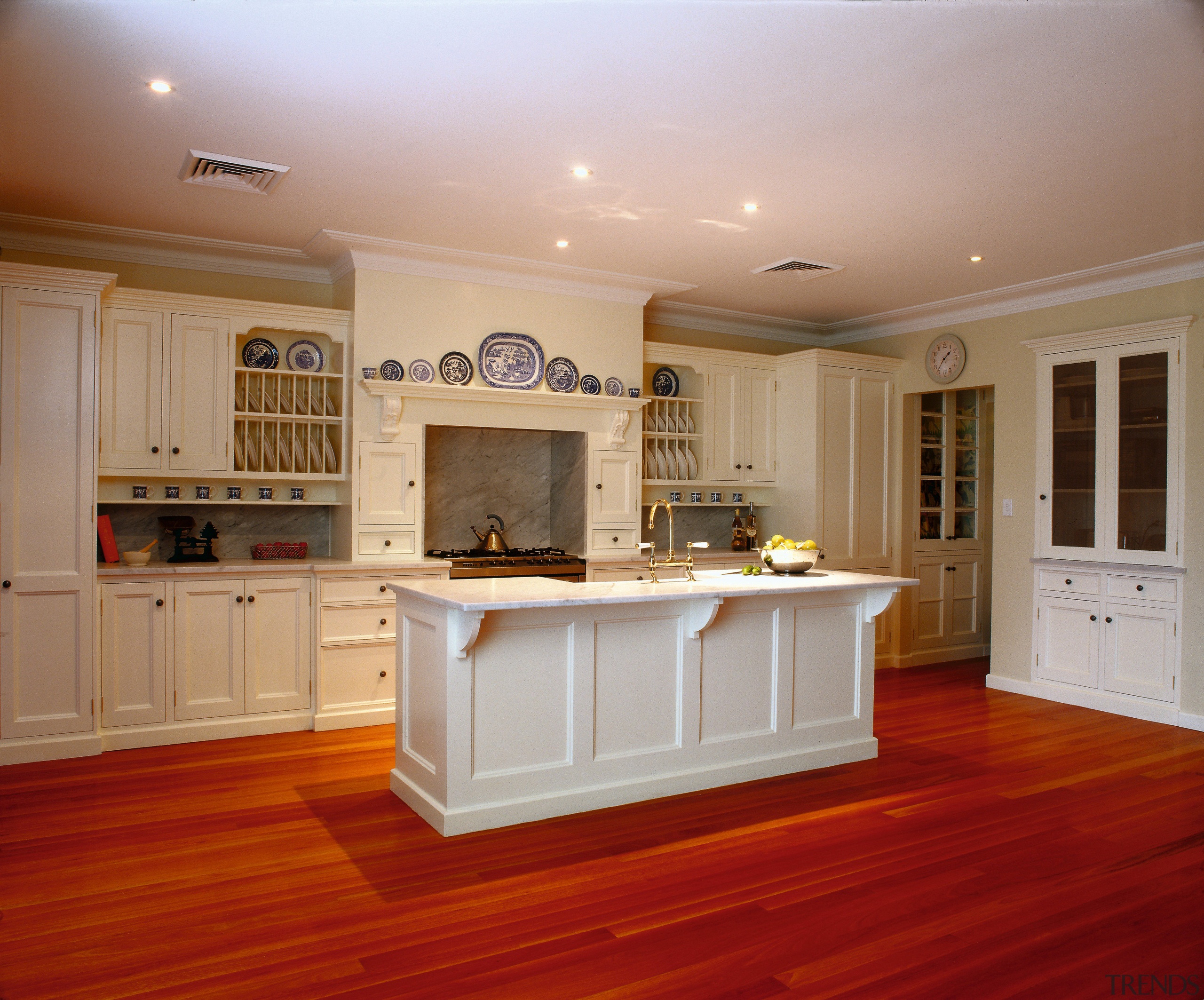 A kitchen with a classic feel - A cabinetry, countertop, cuisine classique, estate, floor, flooring, hardwood, home, interior design, kitchen, laminate flooring, real estate, room, wood flooring, red, gray