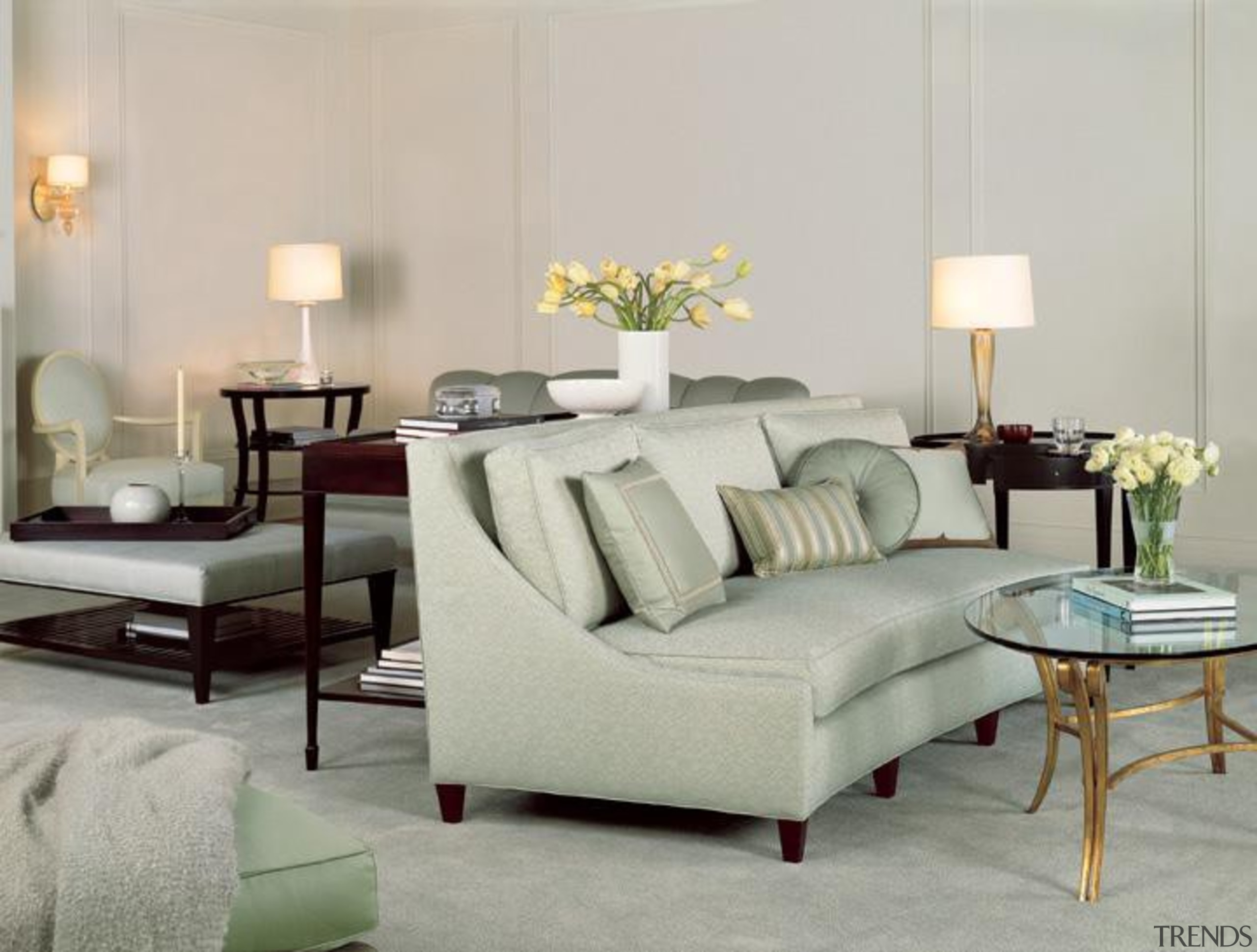 "A good room is an overall harmonious composition bed frame, chair, coffee table, couch, floor, flooring, furniture, home, interior design, living room, loveseat, room, sofa bed, table, wall, gray