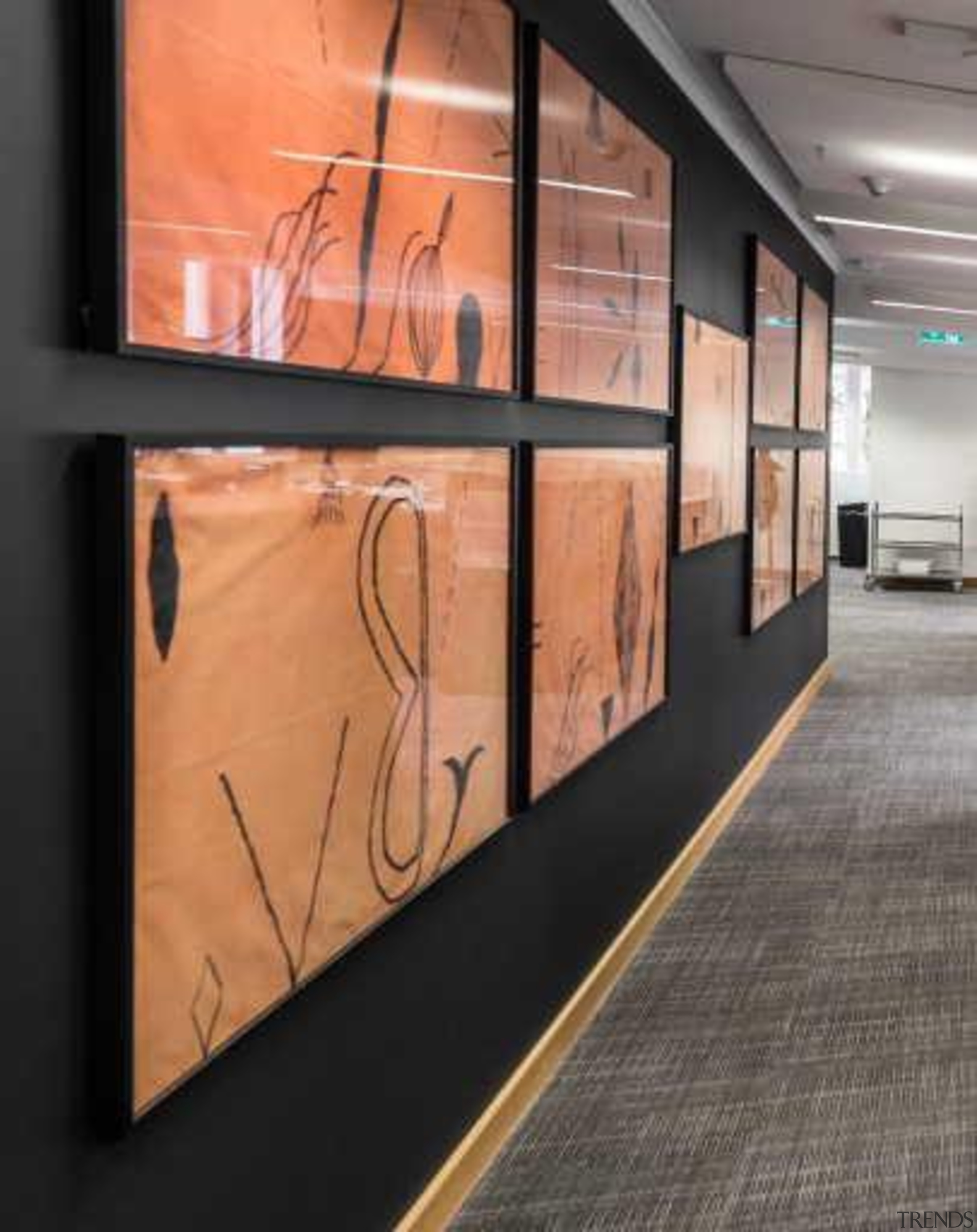 New acoustic walls were also built," says Sami. exhibition, floor, flooring, wall, black, orange, gray