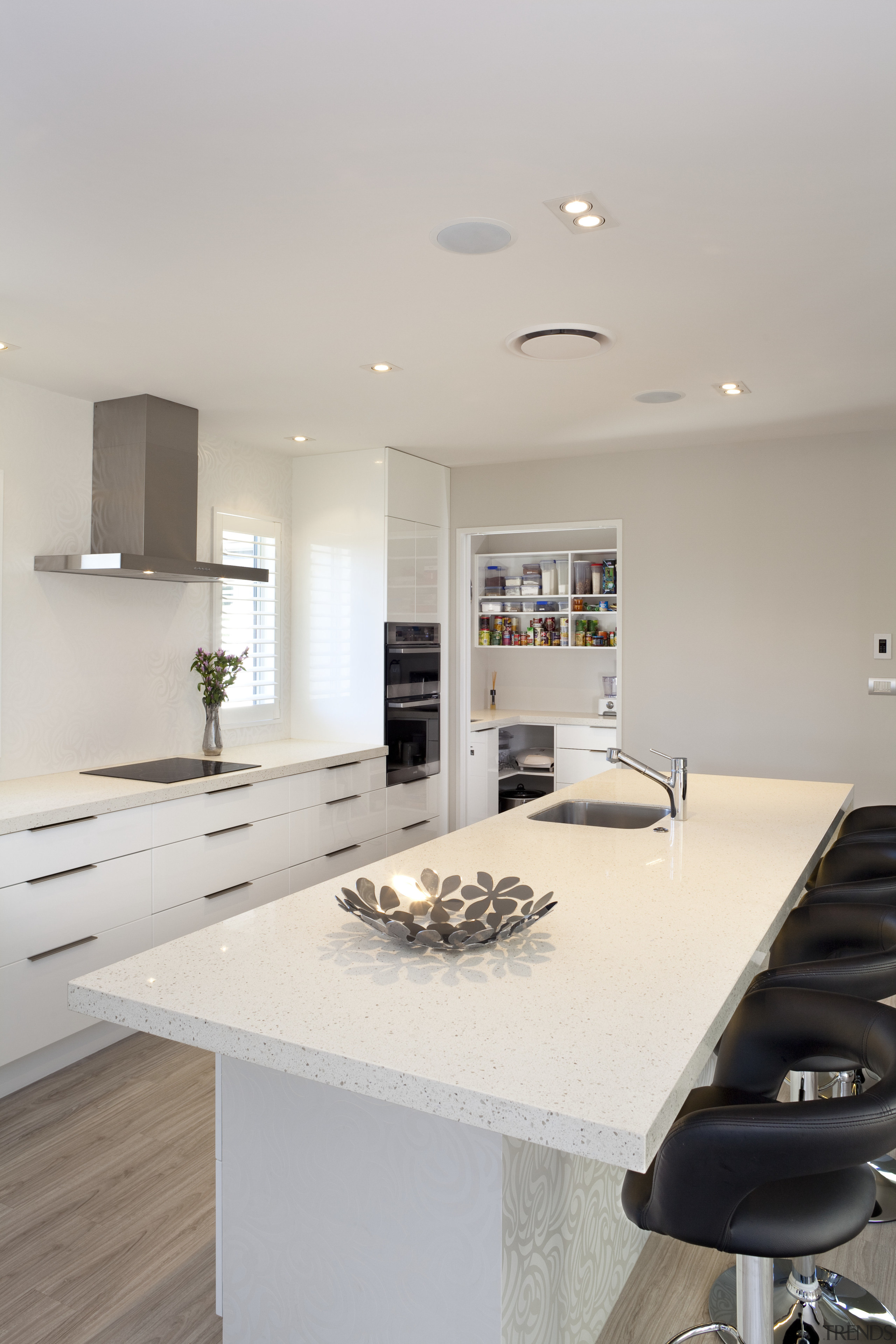 Kitchen with white island, white cabinetry, stainless hood countertop, interior design, kitchen, real estate, room, gray