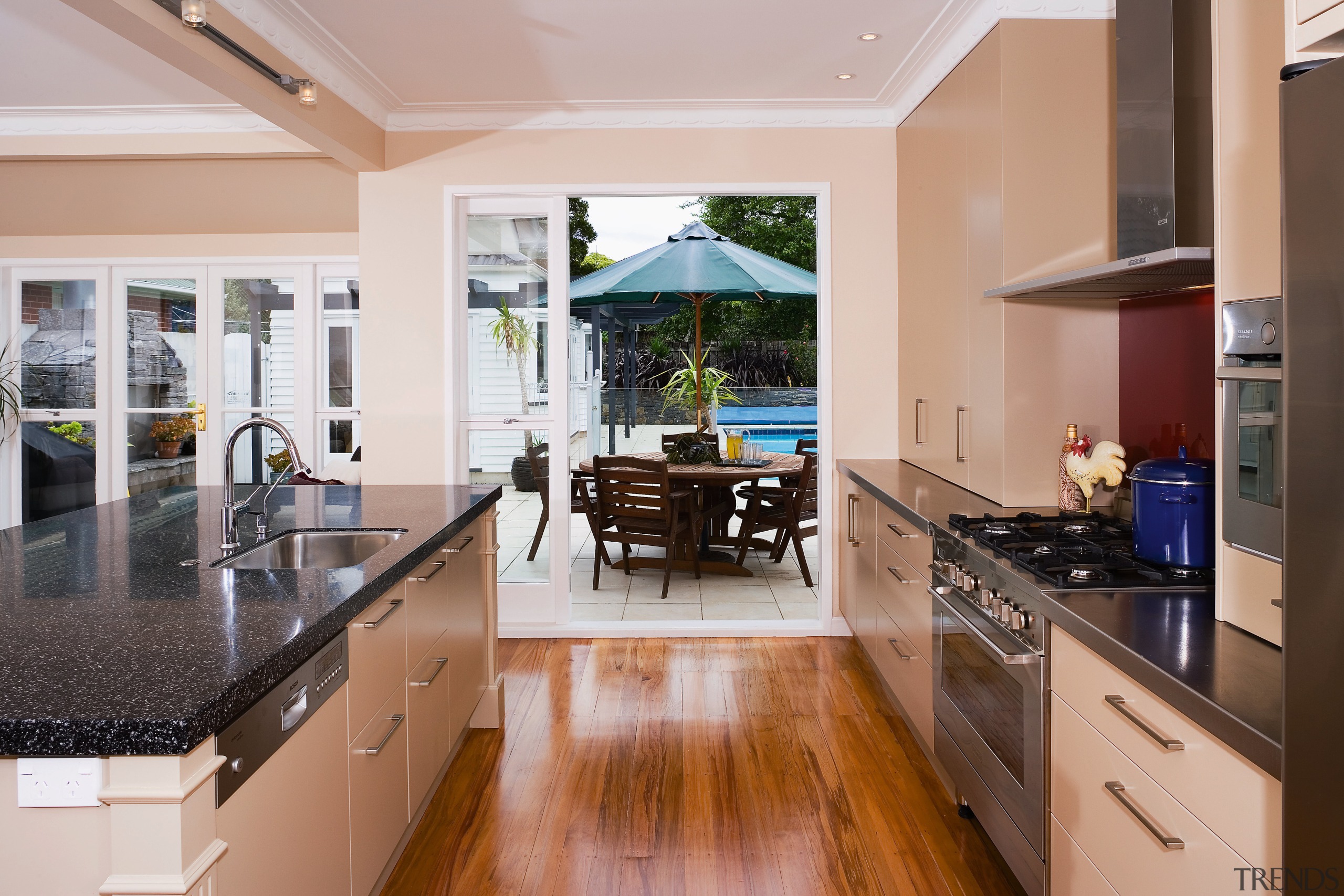 A view of the kitchen area, wooden flooring, countertop, interior design, kitchen, real estate, room, window, gray