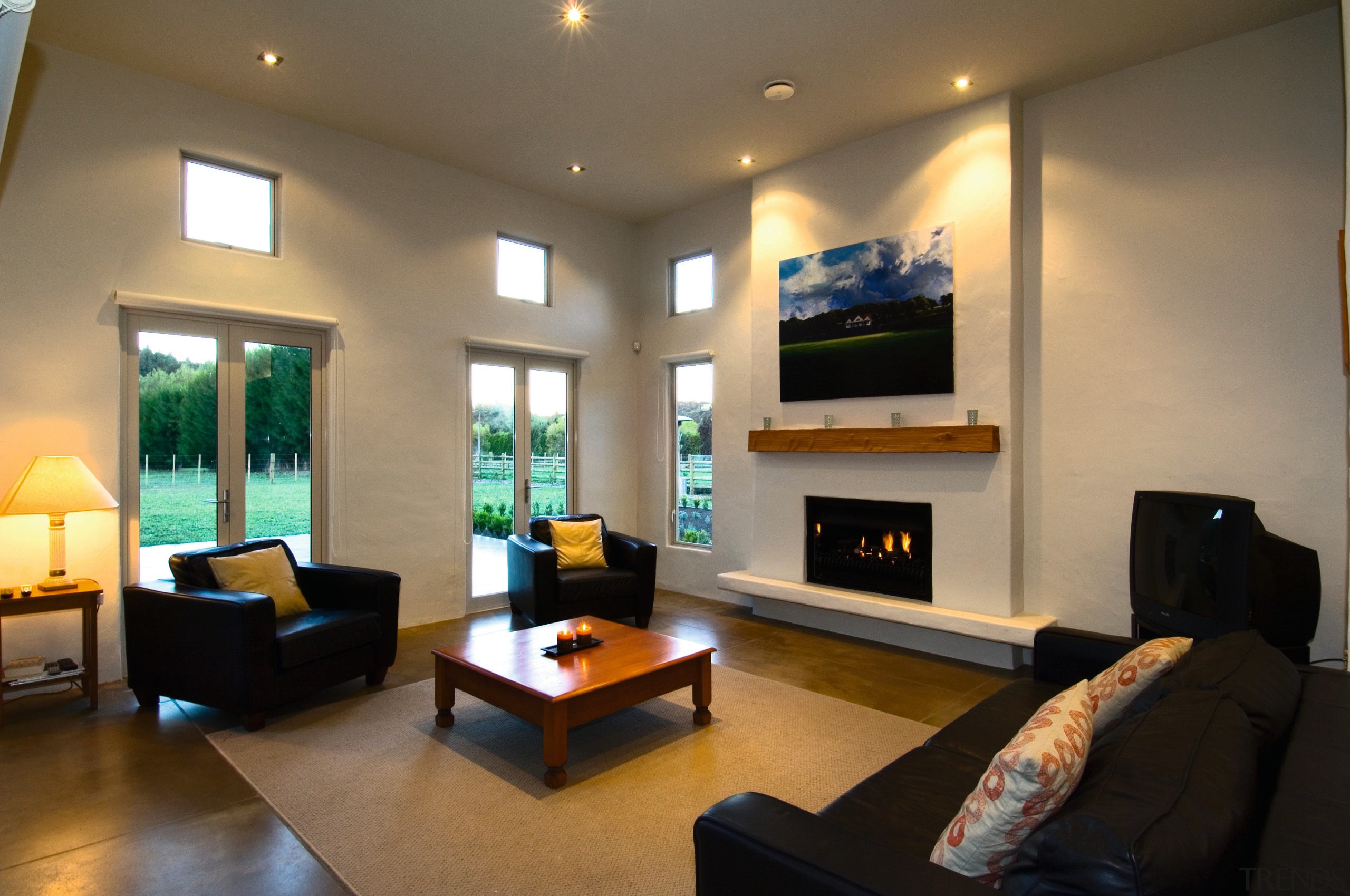 Family living room with cream walls, black lounge ceiling, hearth, interior design, living room, property, real estate, room, brown