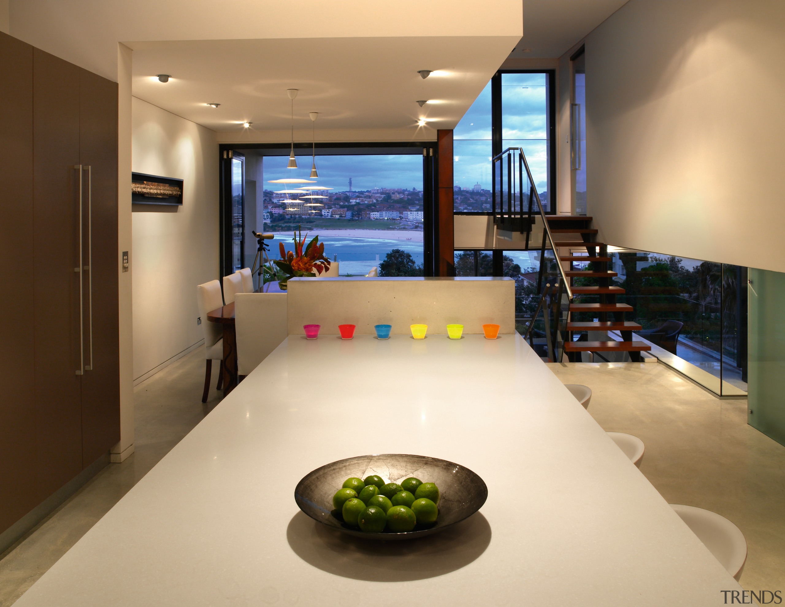 A view of the kitchen area featuring polished interior design, room, orange, brown