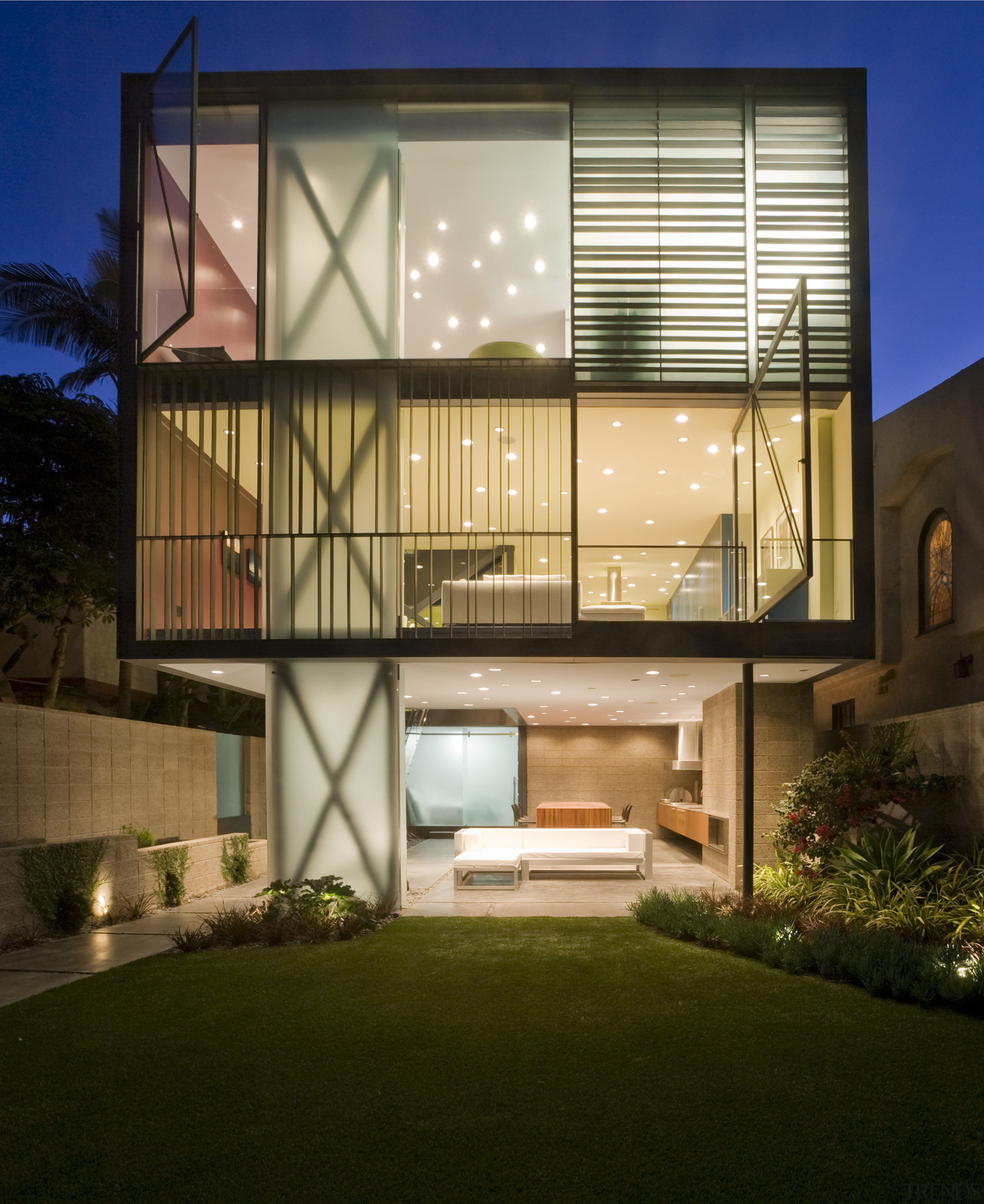 Modern home with vibrant walls, outdoor living room apartment, architecture, building, condominium, daylighting, elevation, estate, facade, home, house, mixed use, property, real estate, residential area, window, brown