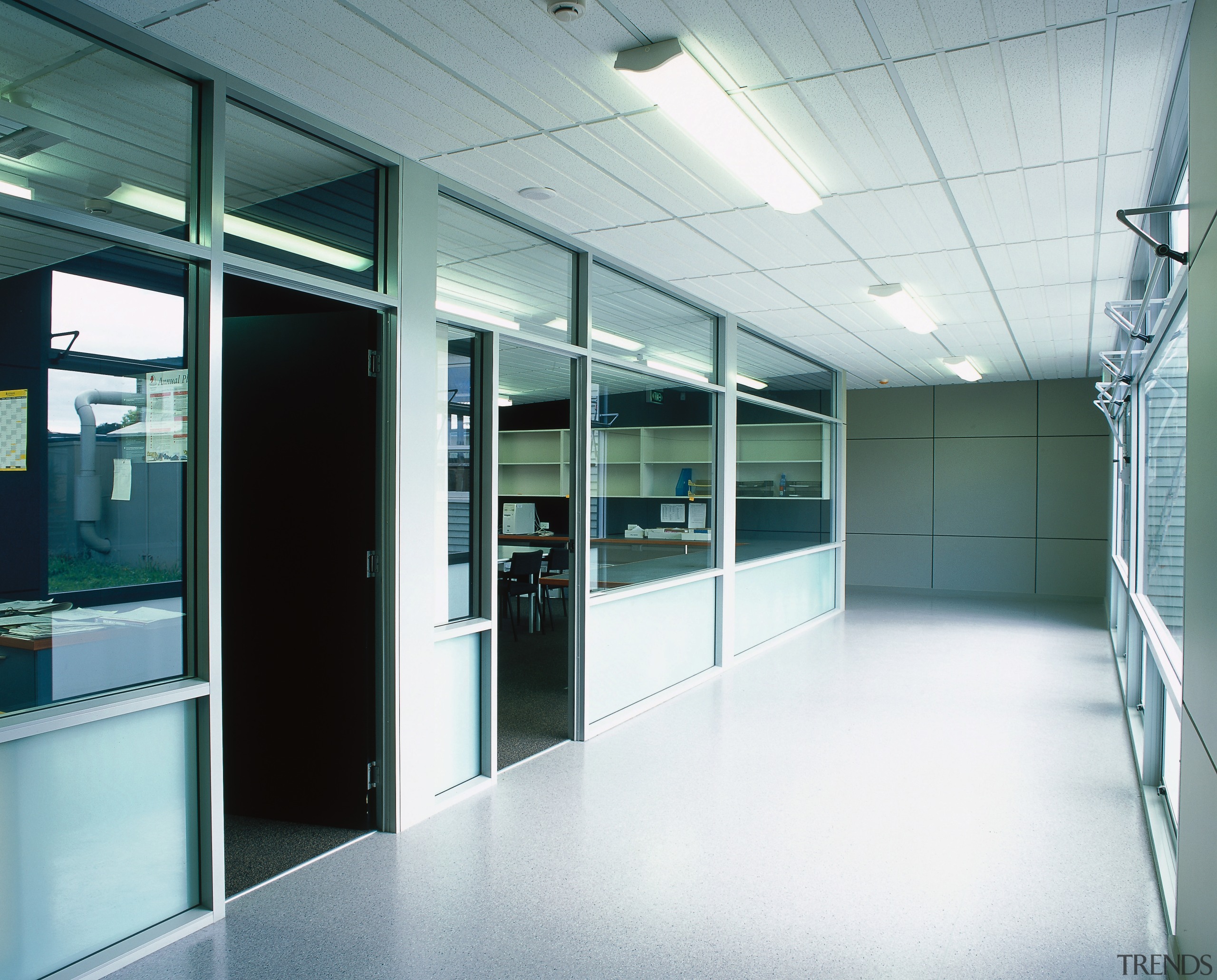 View of corridor outside classroom with wall of ceiling, door, floor, glass, interior design, office, wall, window, white