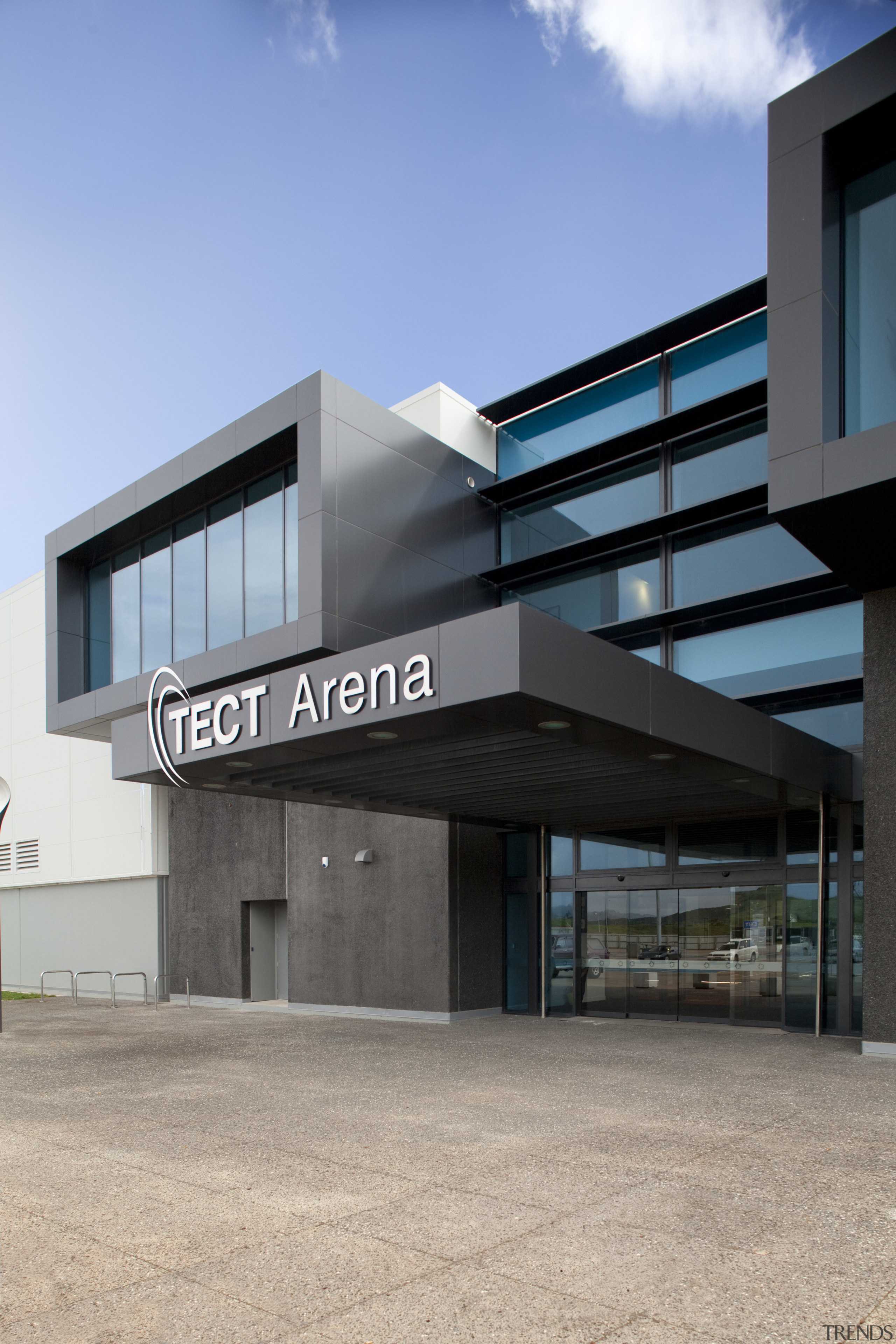 Exterior with dark grey cladding and TECT Arena architecture, building, commercial building, corporate headquarters, facade, real estate, gray, teal