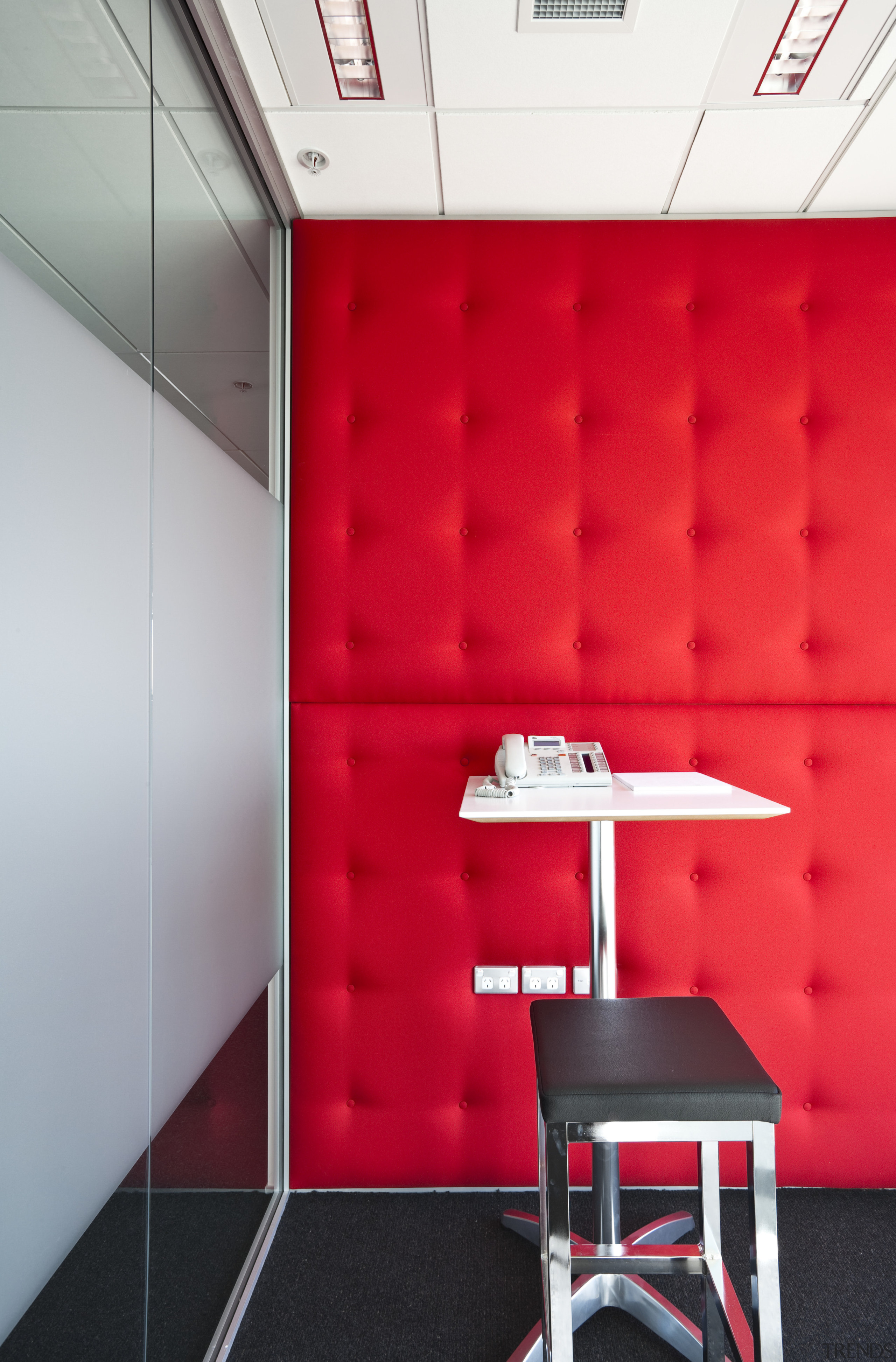 The office interiors at the Club Tower reflect architecture, ceiling, design, floor, furniture, interior design, product, product design, red, table, wall, red, gray