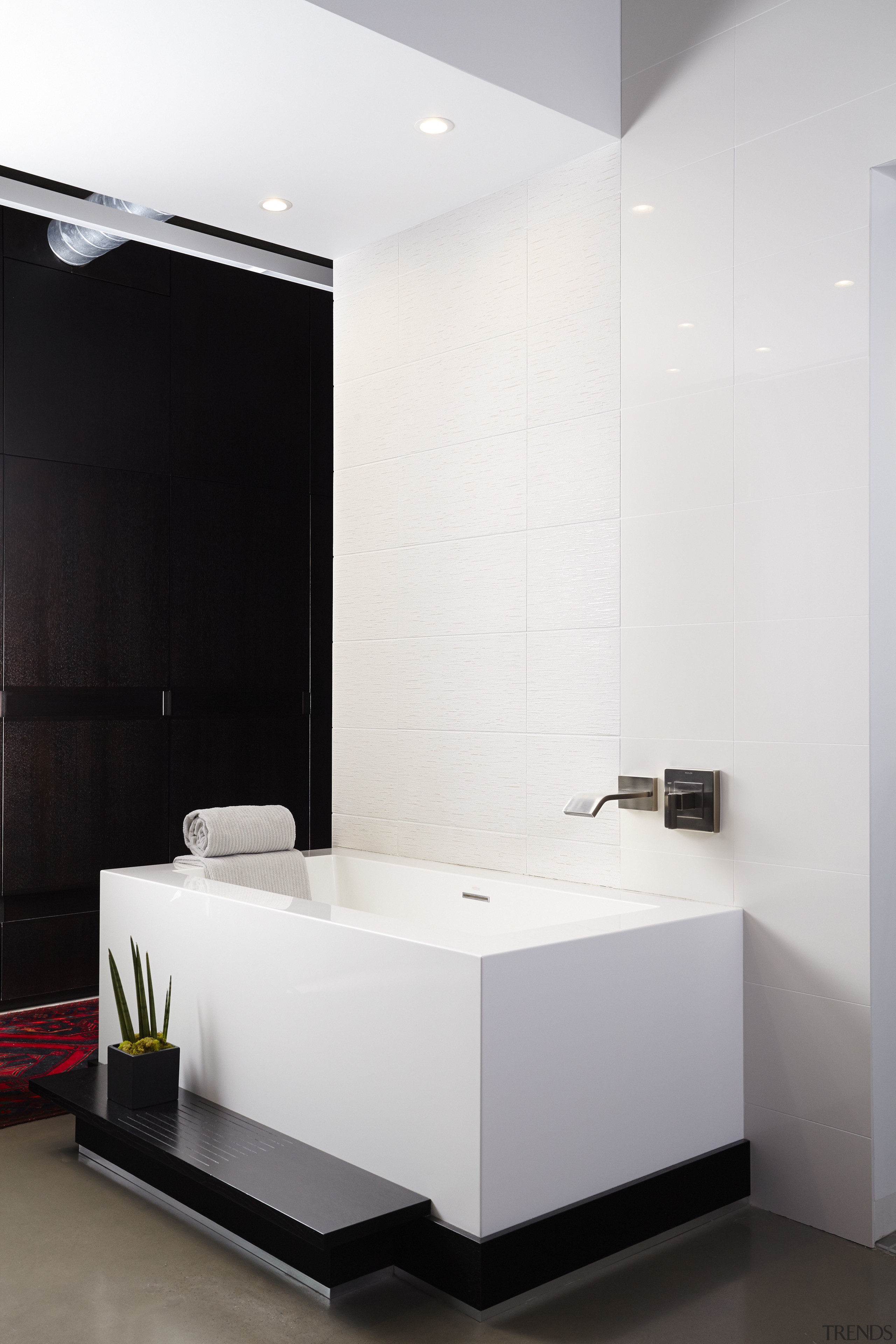 This bathroom refit by designer Jodi Gillespie complements bathroom, floor, interior design, plumbing fixture, product design, room, sink, white, black