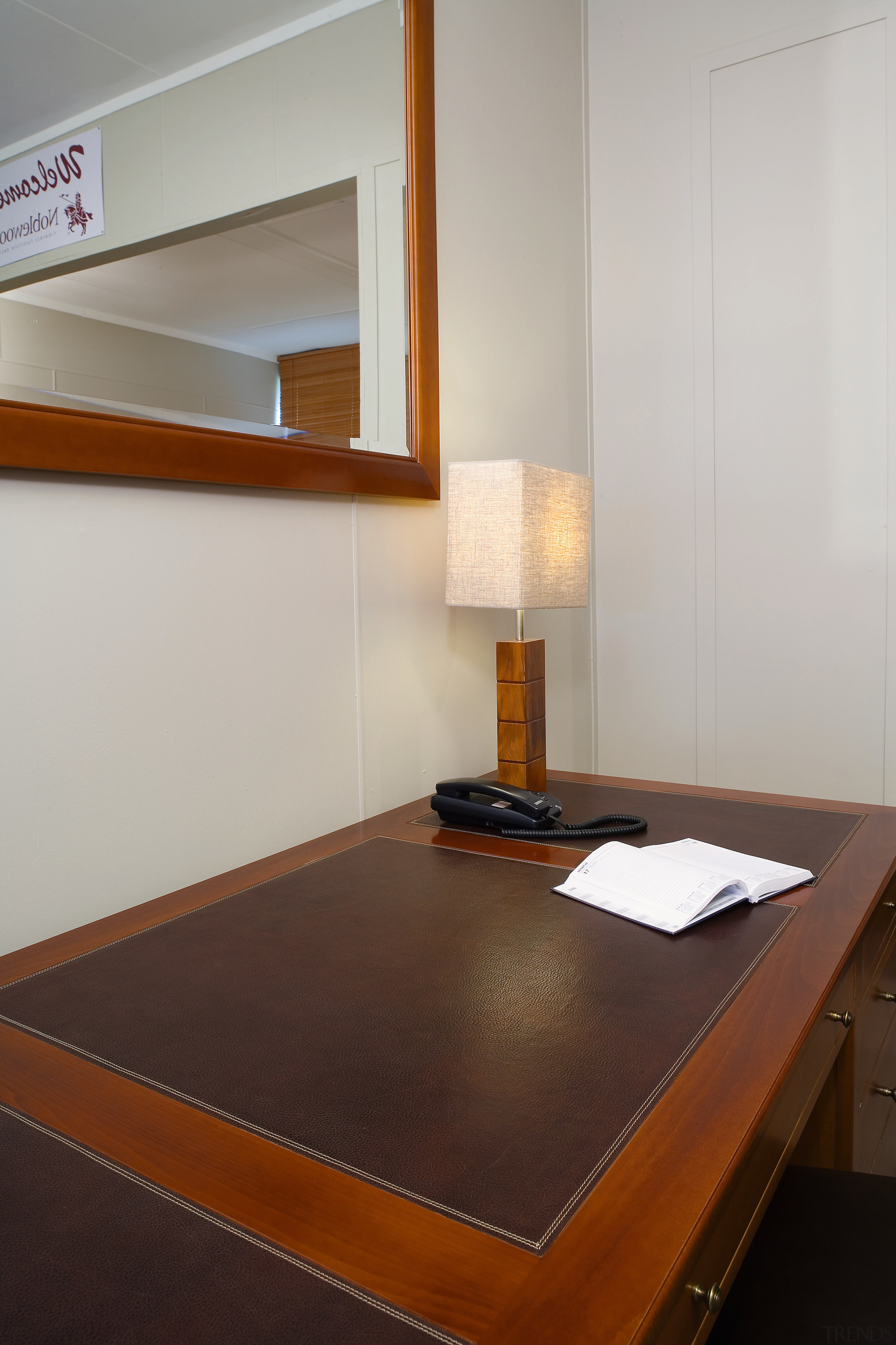 A view of some wooden furniture from Noblewood. architecture, floor, flooring, furniture, interior design, product design, room, table, wood, gray