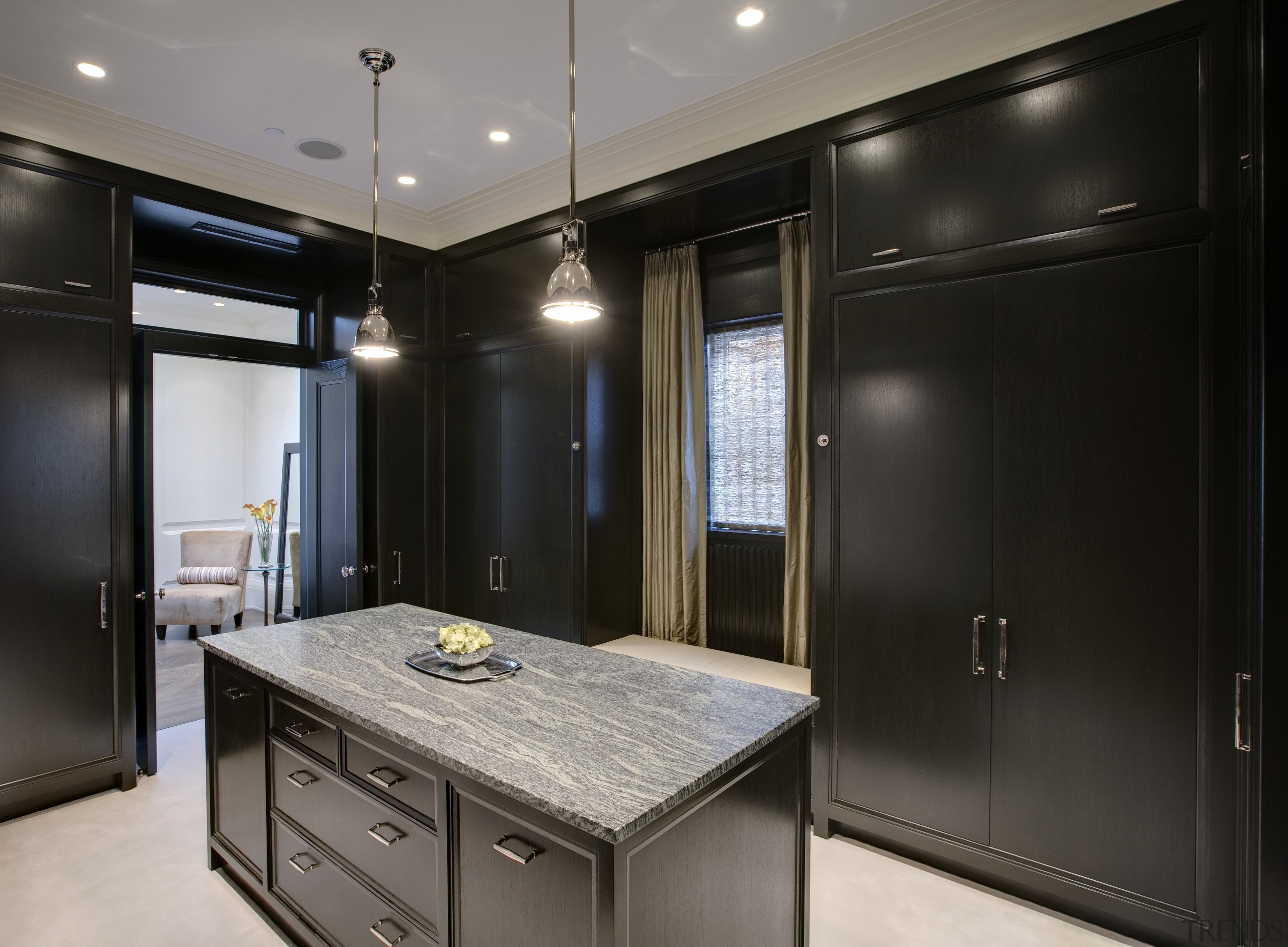 View of the dressing room featuring closets made cabinetry, countertop, interior design, kitchen, room, black, gray
