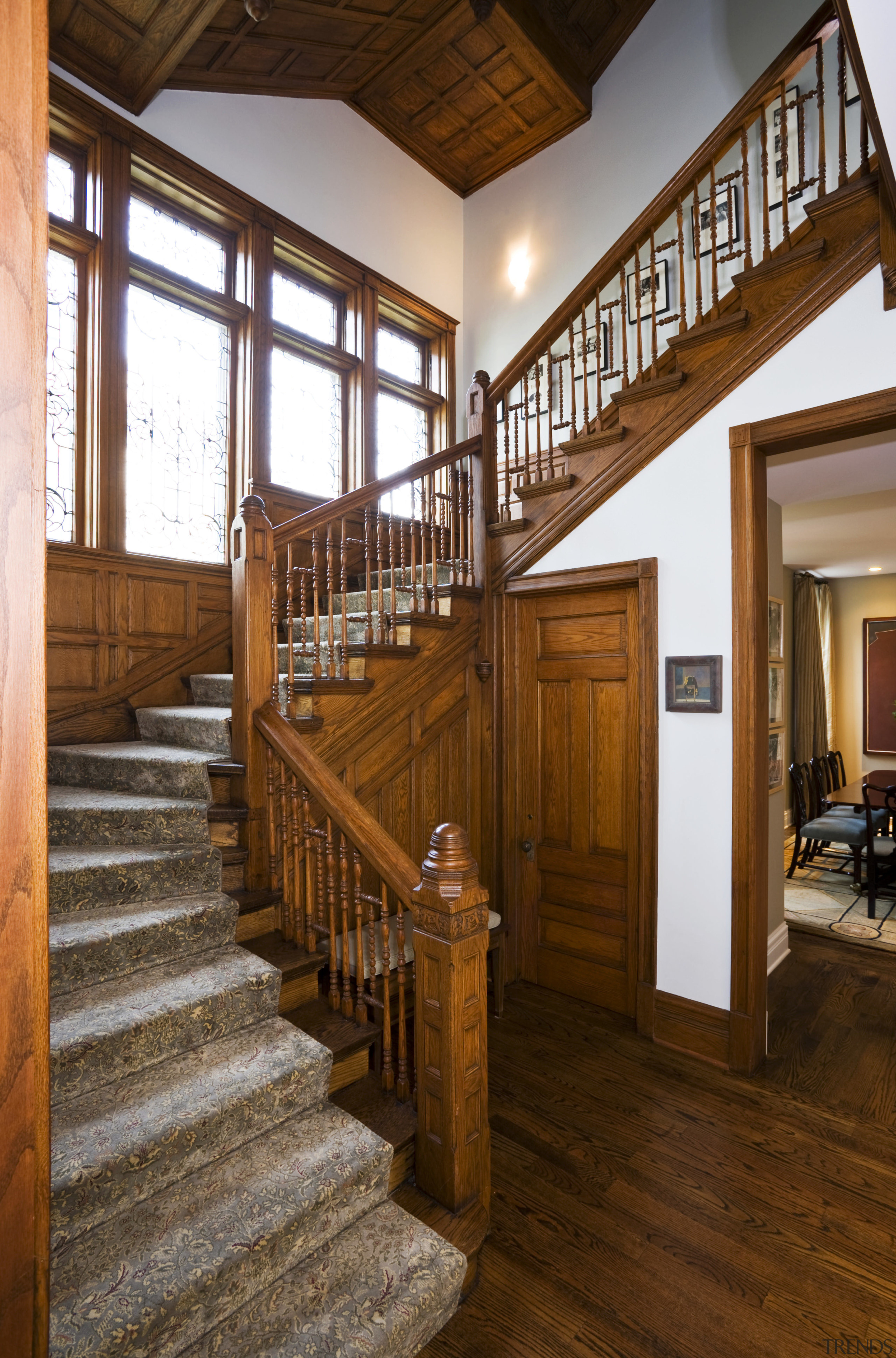 View of the staircase showing the joinery, lighting, beam, floor, flooring, handrail, hardwood, home, interior design, real estate, stairs, wood, brown