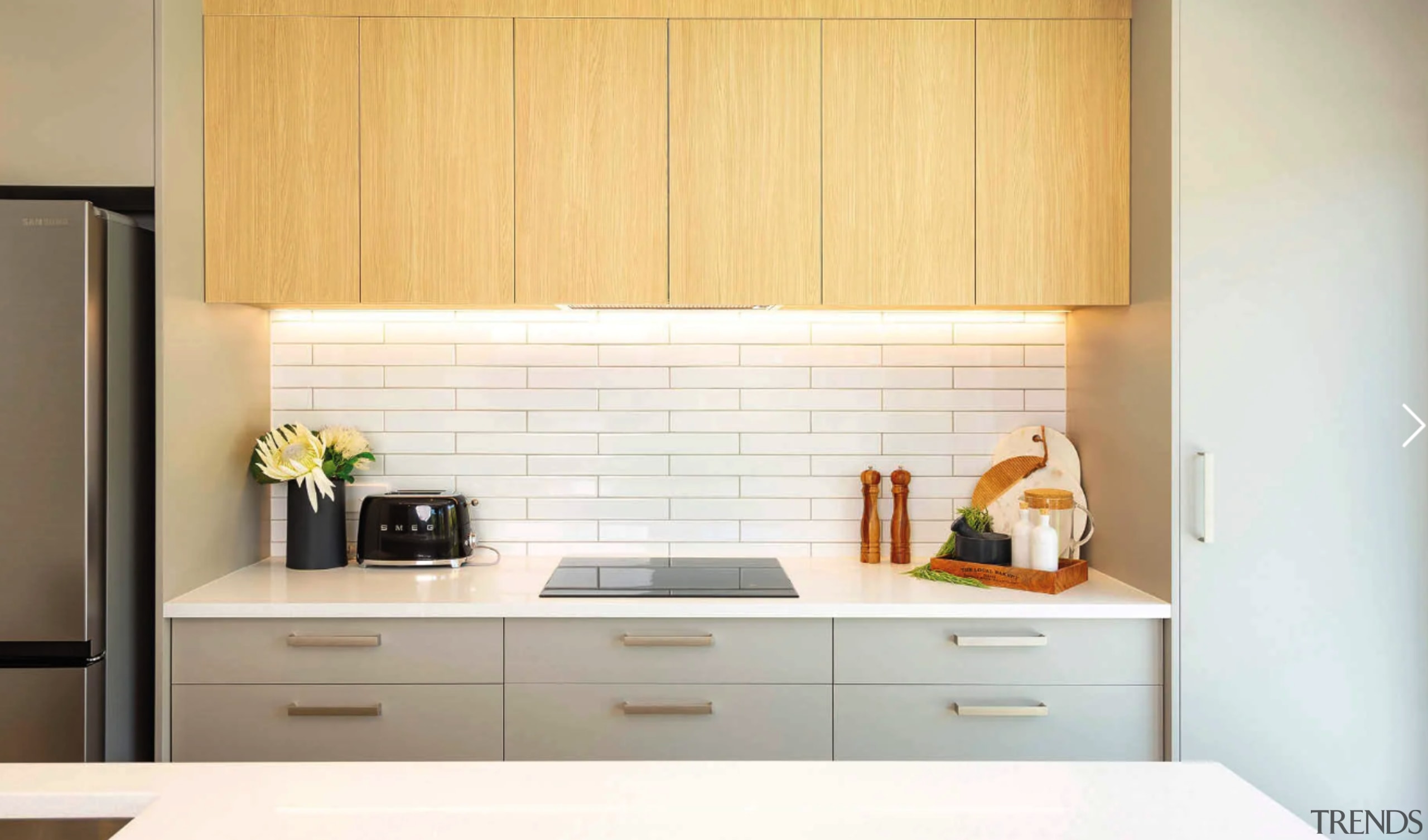 Kitchen detail showing subway tile splashback accentuated by 