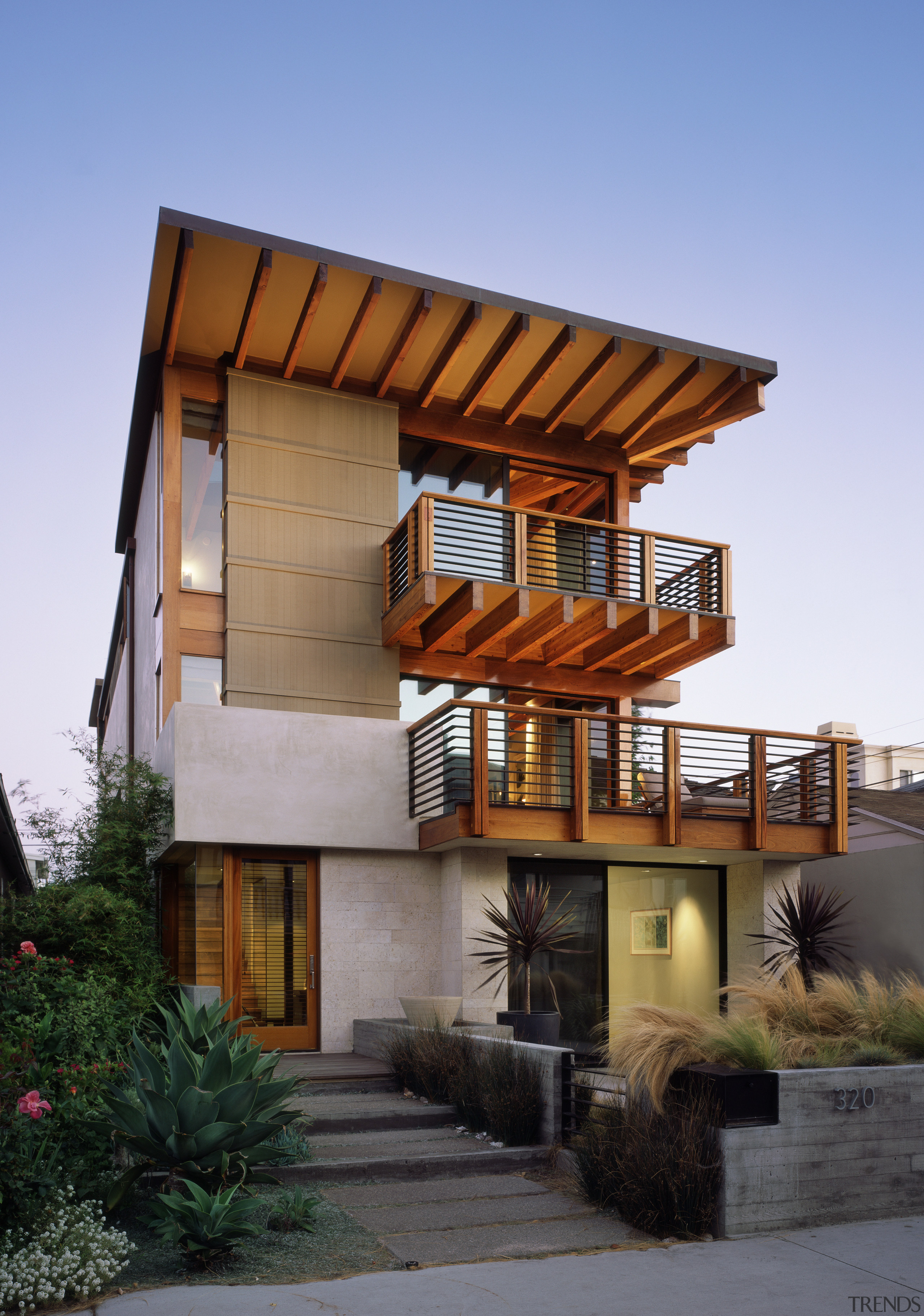 The lower floor contains a rumpus room with architecture, building, elevation, facade, home, house, property, real estate, residential area, siding, teal
