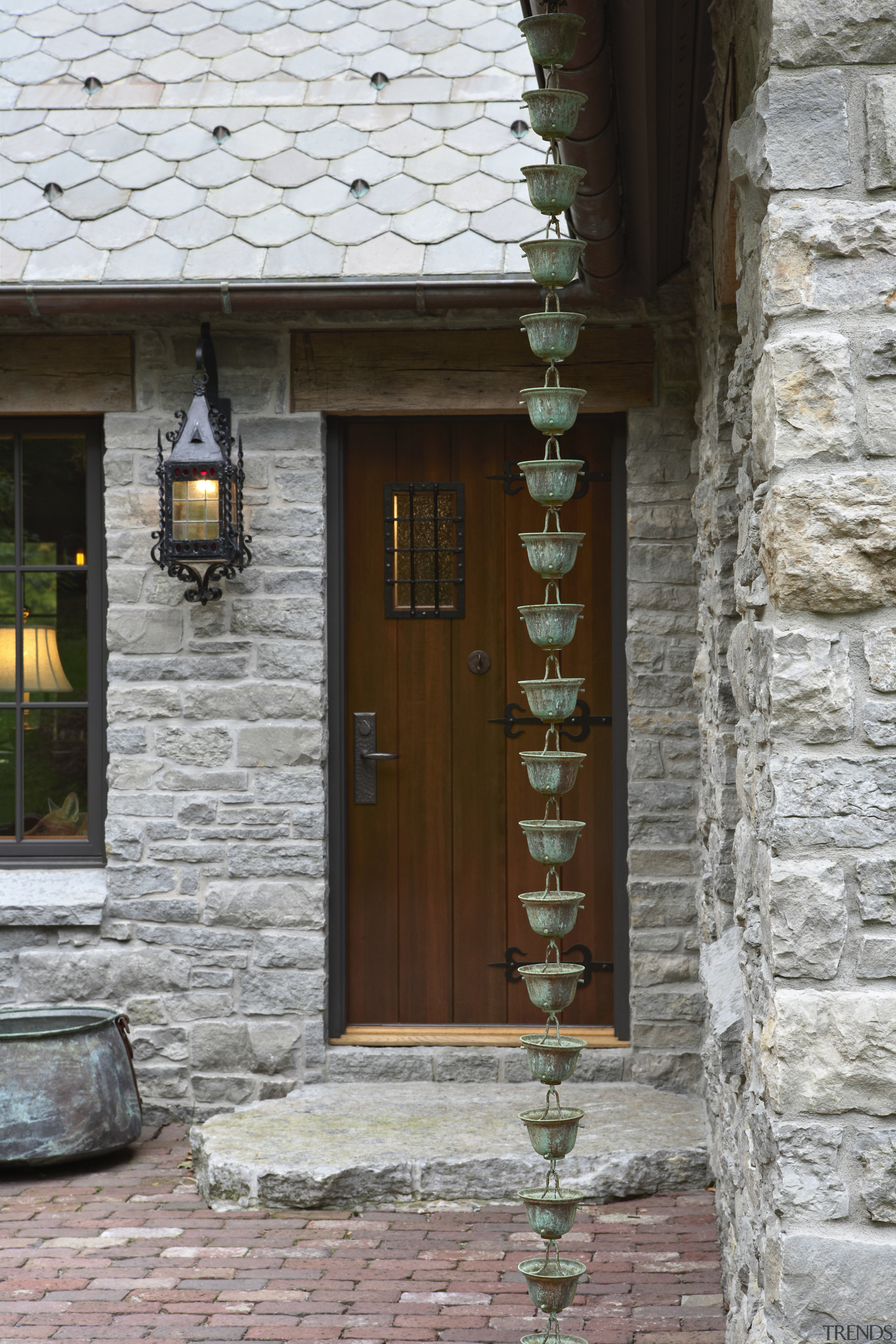 Entrance way with stone cladding. - Entrance way door, facade, house, window, wood, gray