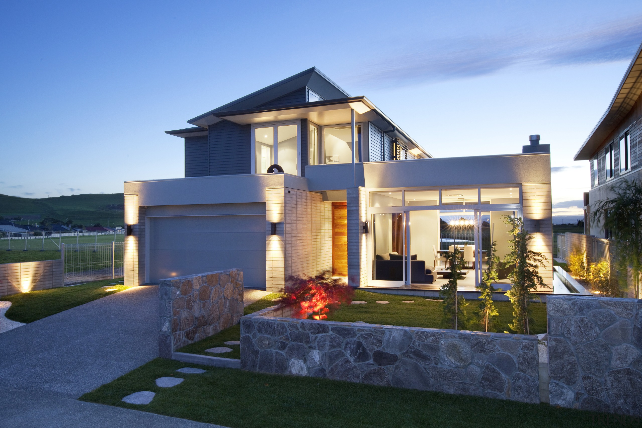 Contemporary home by Coast Papamoa - Contemporary home backyard, elevation, estate, facade, home, house, lighting, mansion, property, real estate, residential area, roof, villa, teal, blue