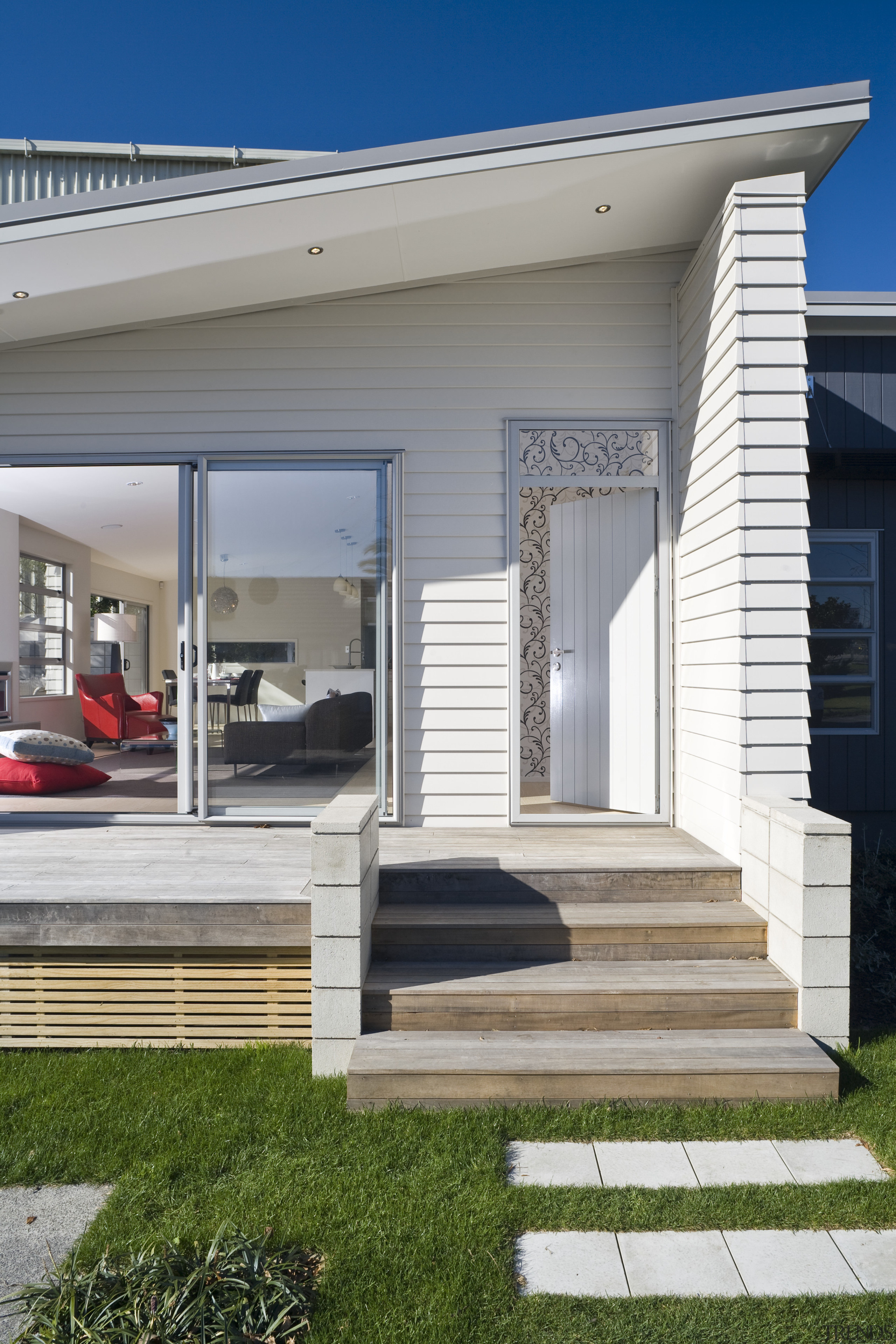 Exterior view of a Harmony Homes show home facade, home, house, porch, property, real estate, residential area, siding, gray