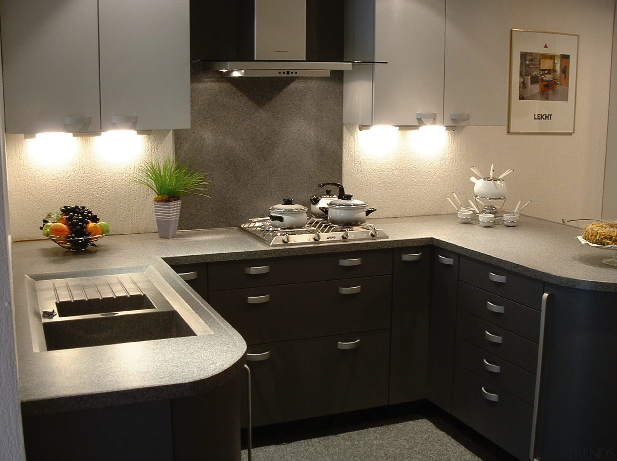 Kitchen with charcoal coloured cabinetry, stone-look benchtop, splashback cabinetry, countertop, cuisine classique, interior design, kitchen, room, black