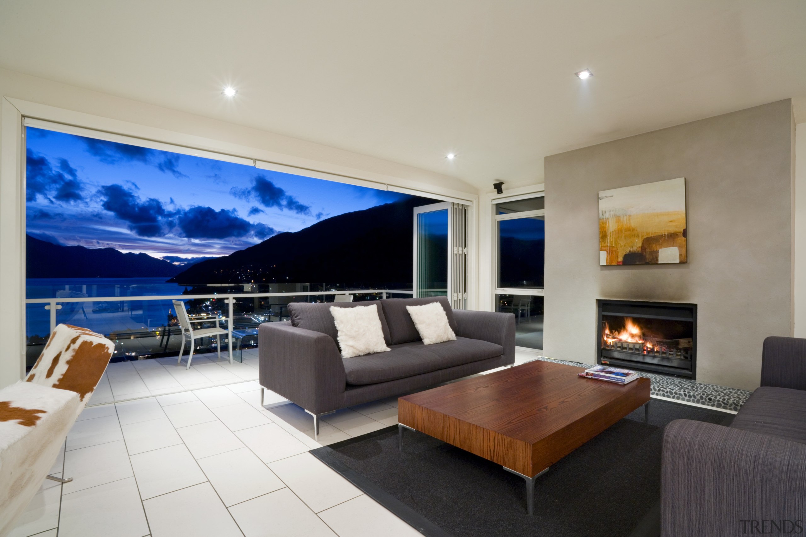 View of the living area featuring cowskin chairs, ceiling, estate, interior design, living room, penthouse apartment, property, real estate, room, gray