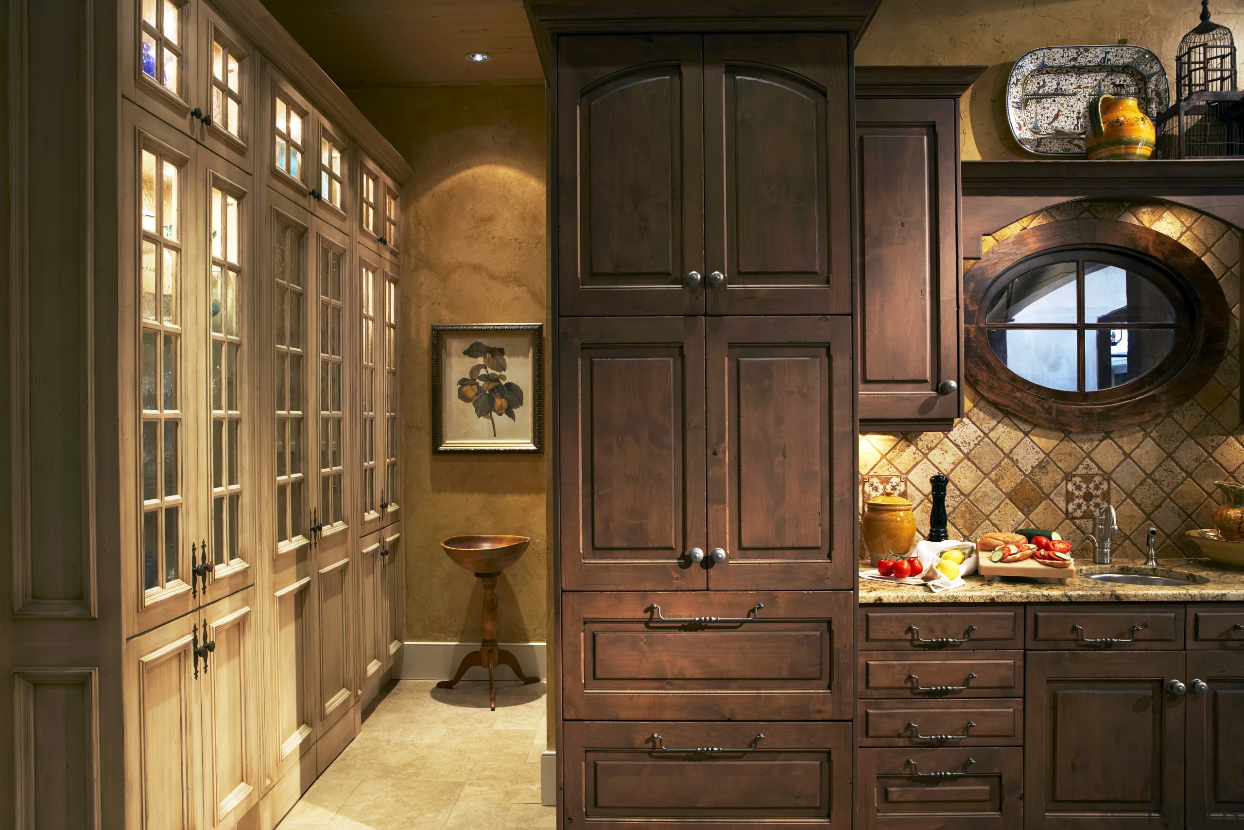 View of kitchen featuring cabinetry, granite countertops, sinks, cabinetry, countertop, cuisine classique, interior design, kitchen, brown