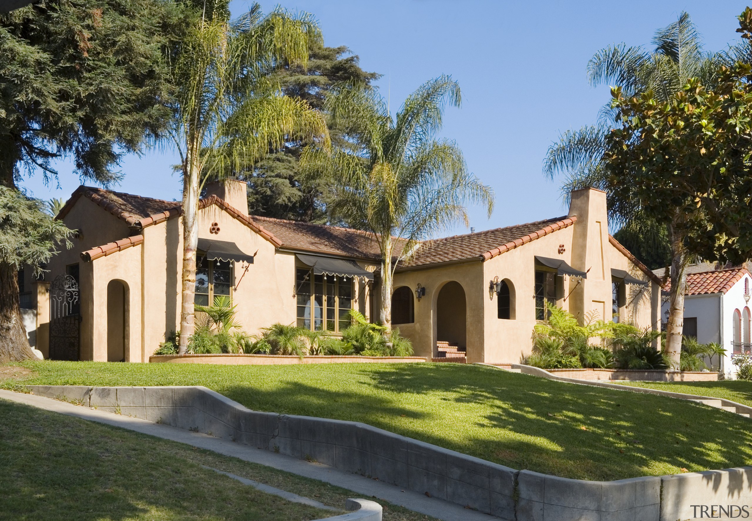 A view of the Valero home. - A cottage, estate, facade, farmhouse, hacienda, home, house, landscape, mansion, property, real estate, residential area, villa, brown