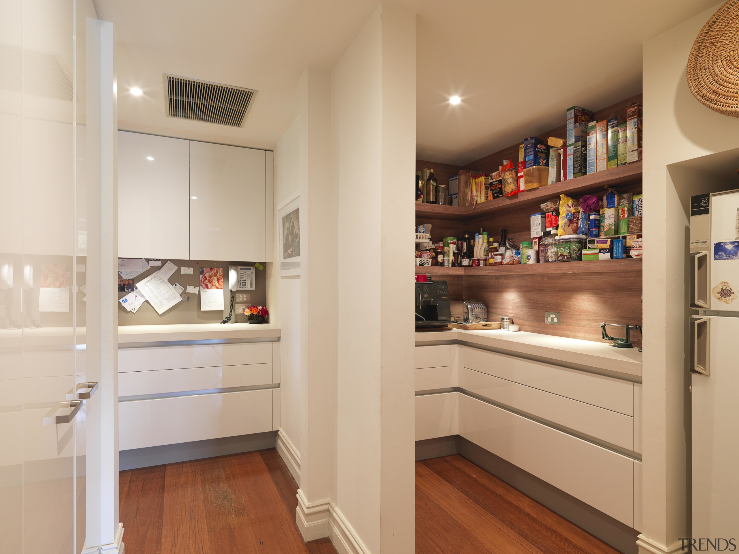 Warm colours featured in this traditional kitchen - cabinetry, countertop, interior design, kitchen, refrigerator, room, orange, gray